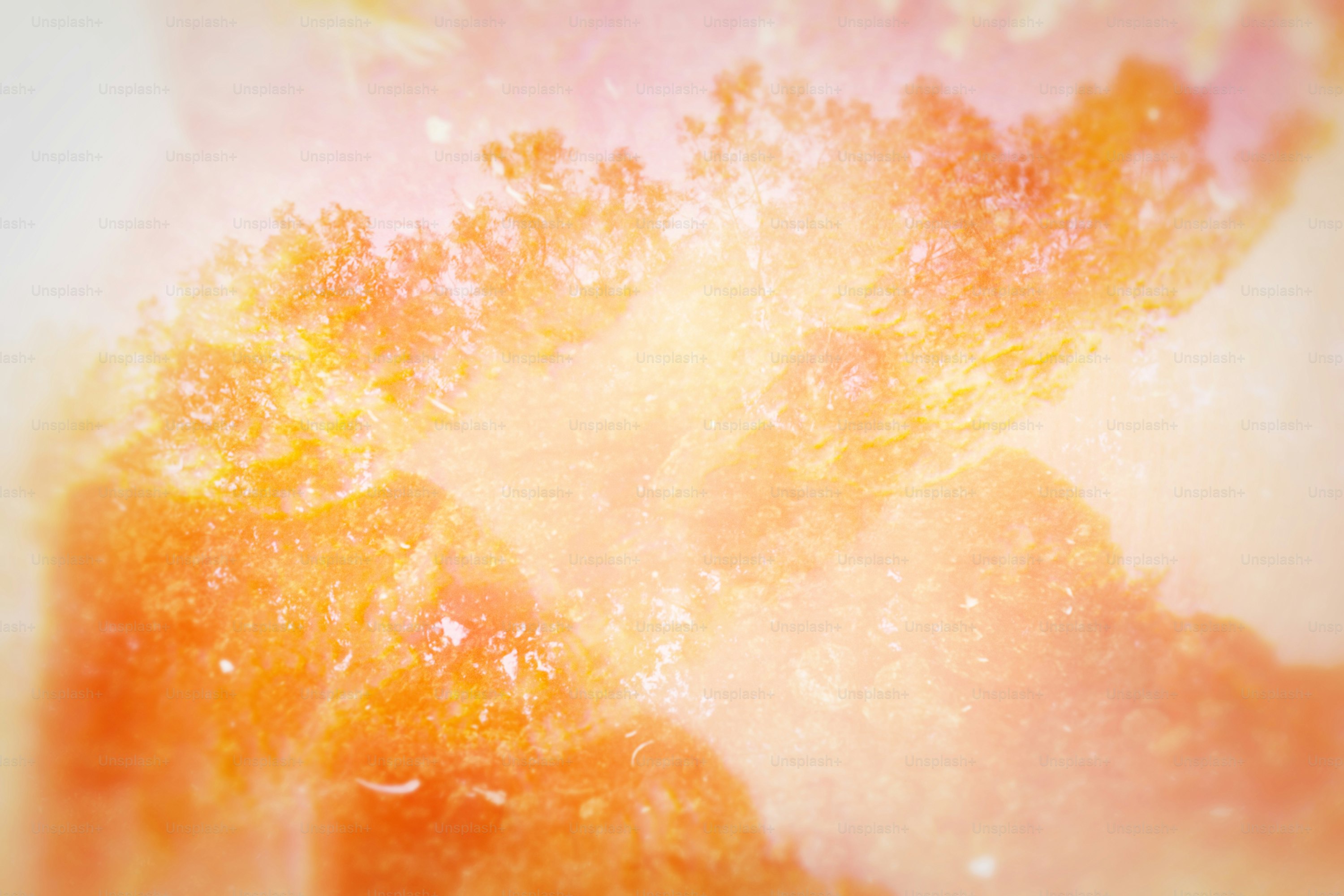 Fond d’aquarelle abstrait orange et jaune doux
