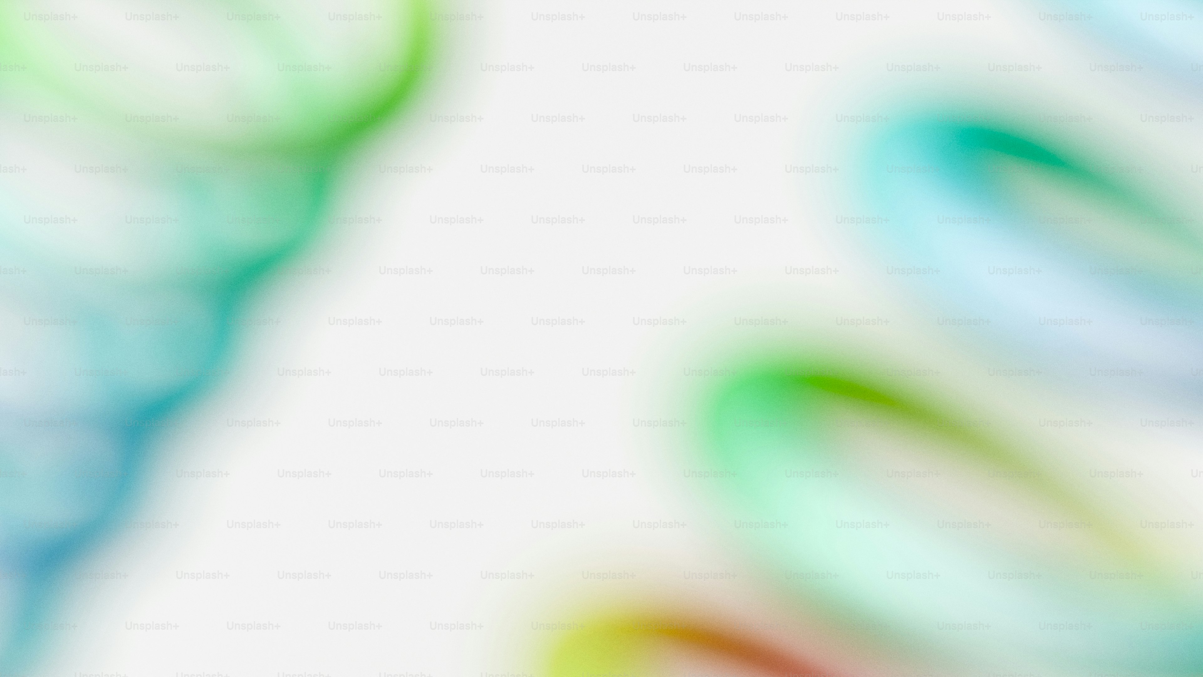 Vibrant blurred abstract shapes on white background