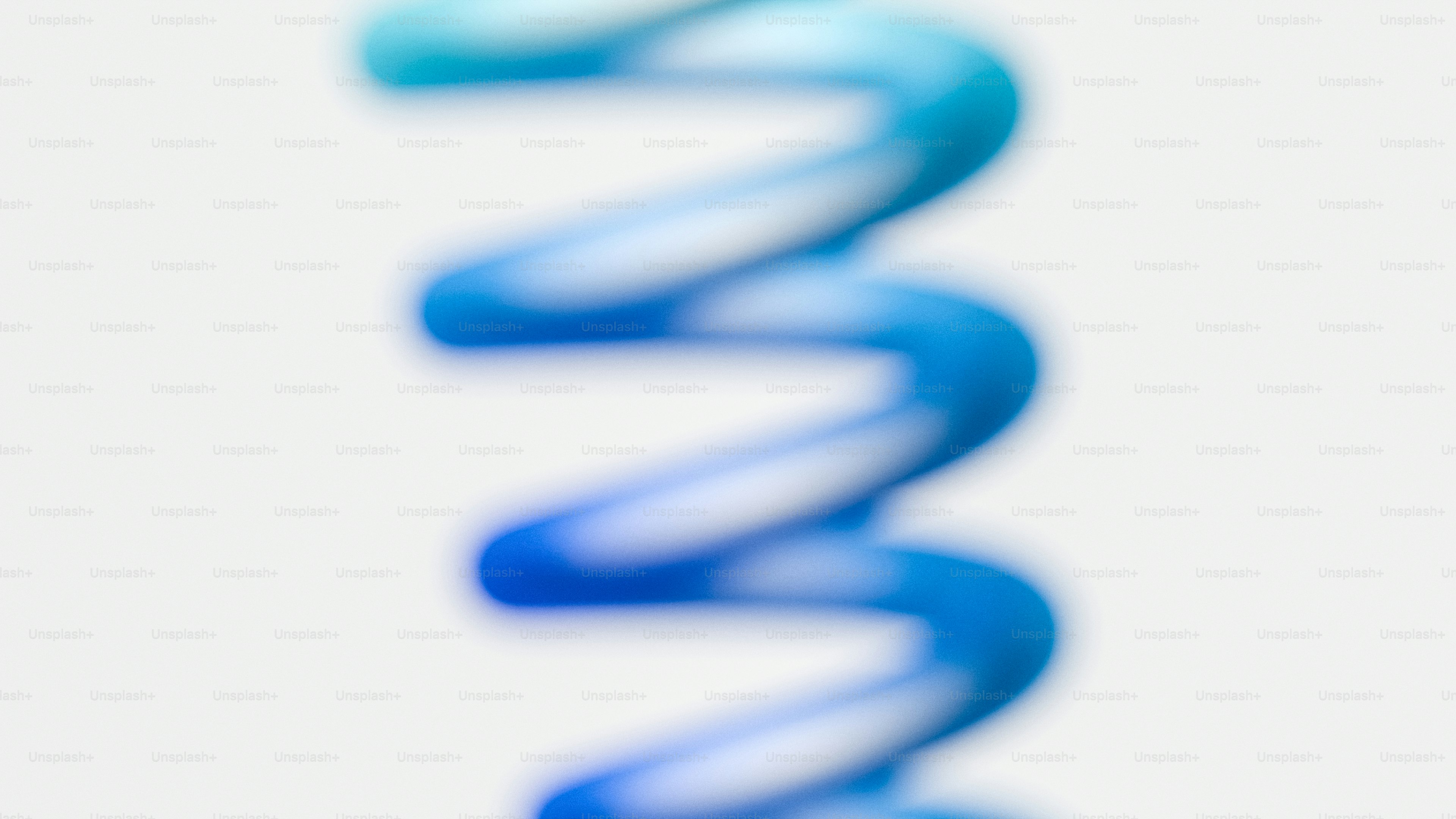 Abstract blurred blue and white spiral