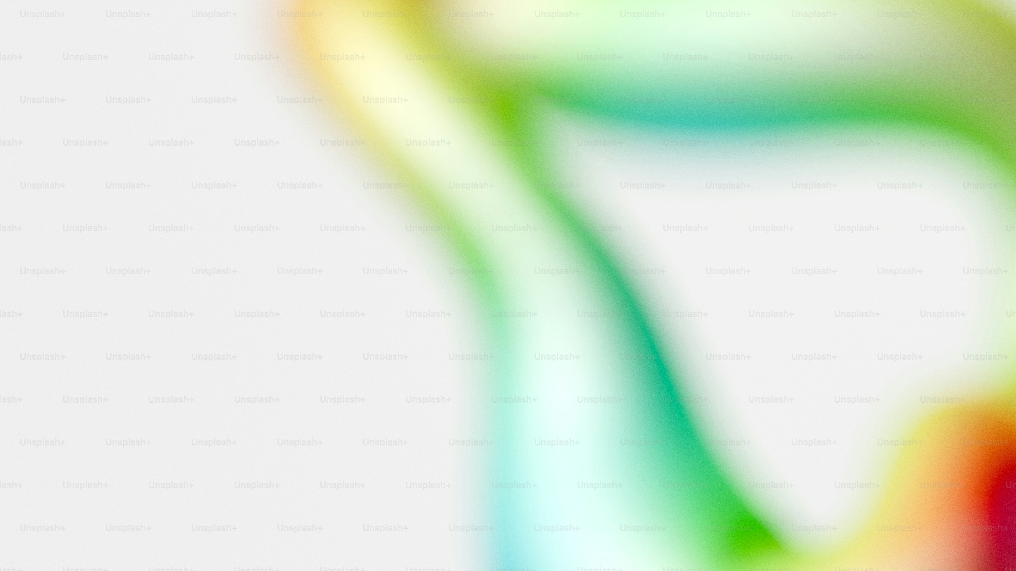 Abstract colorful streaks on a blurred white background