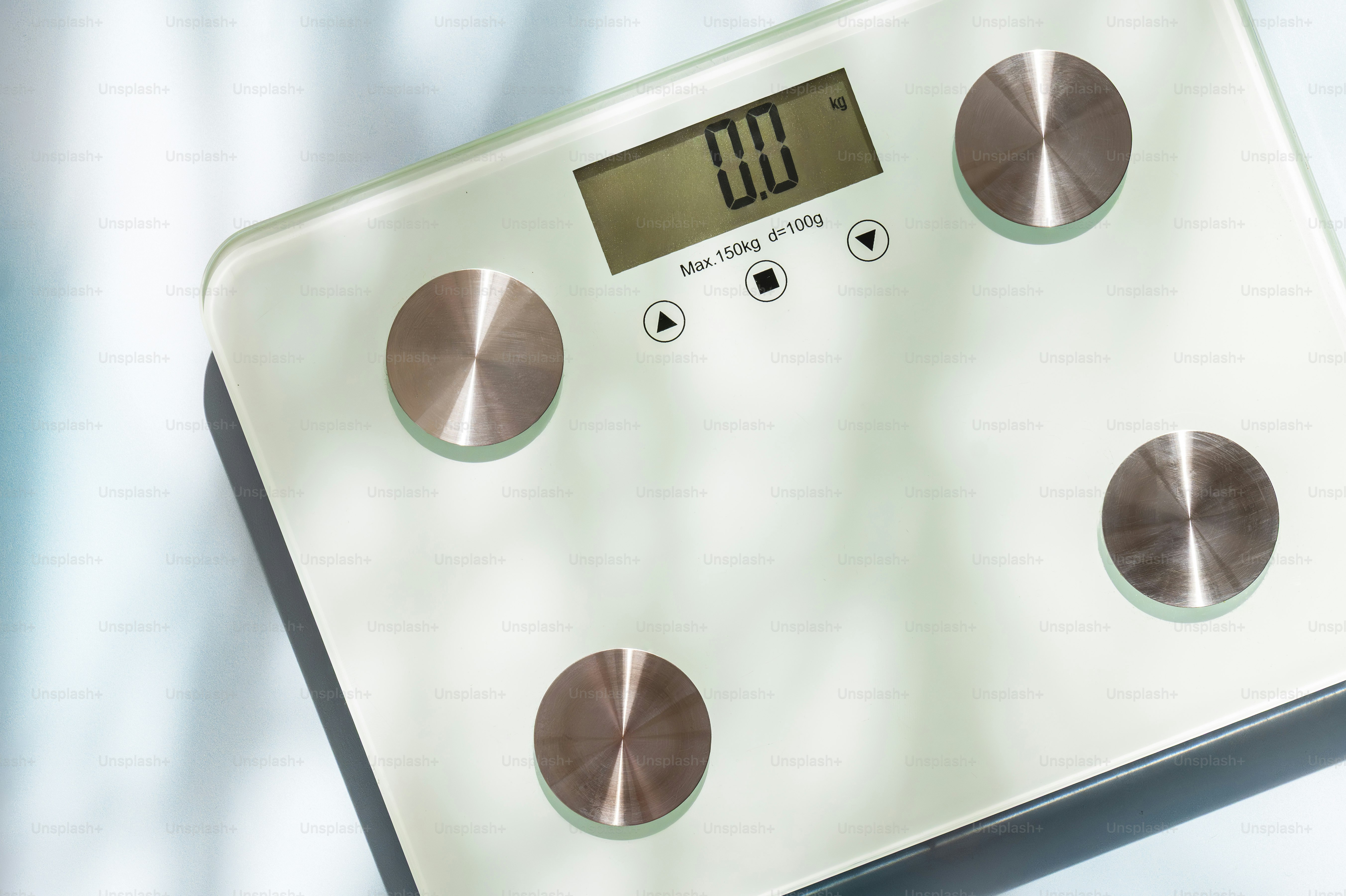 Balance numérique de salle de bain affichant zéro poids