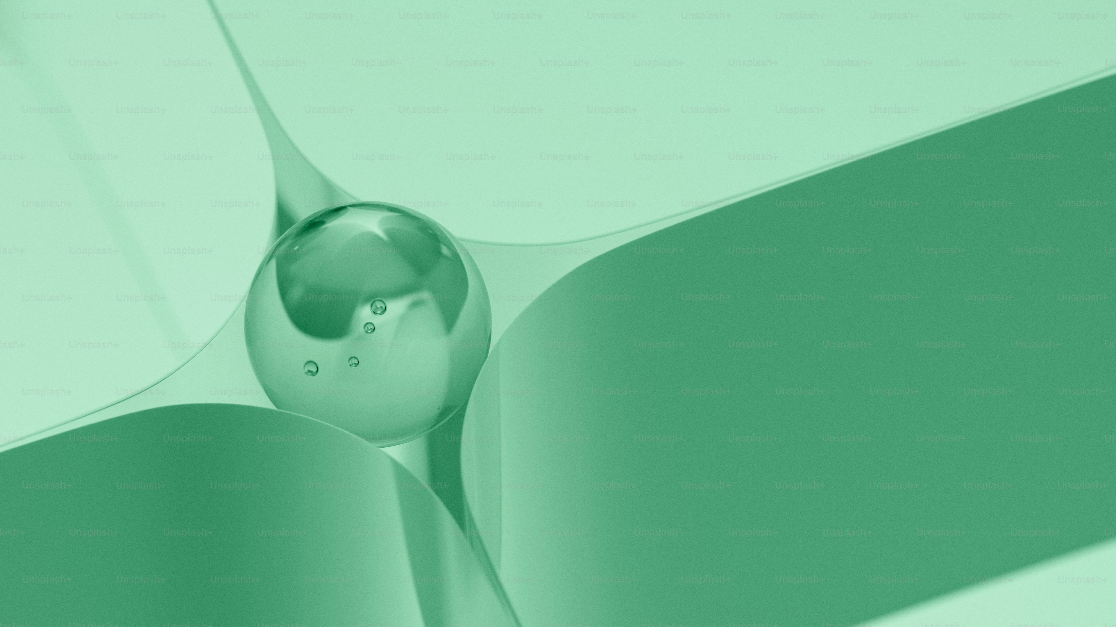 Abstract green curves cradle a reflective glass sphere