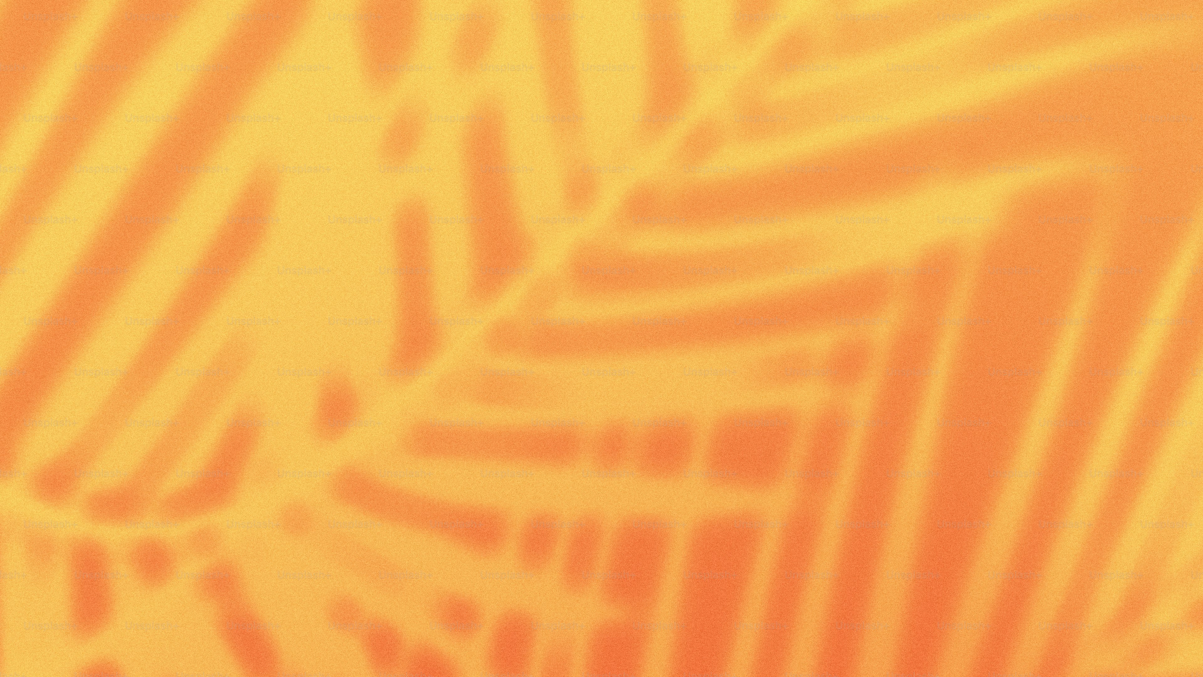 Warm orange background with blurred palm shadows