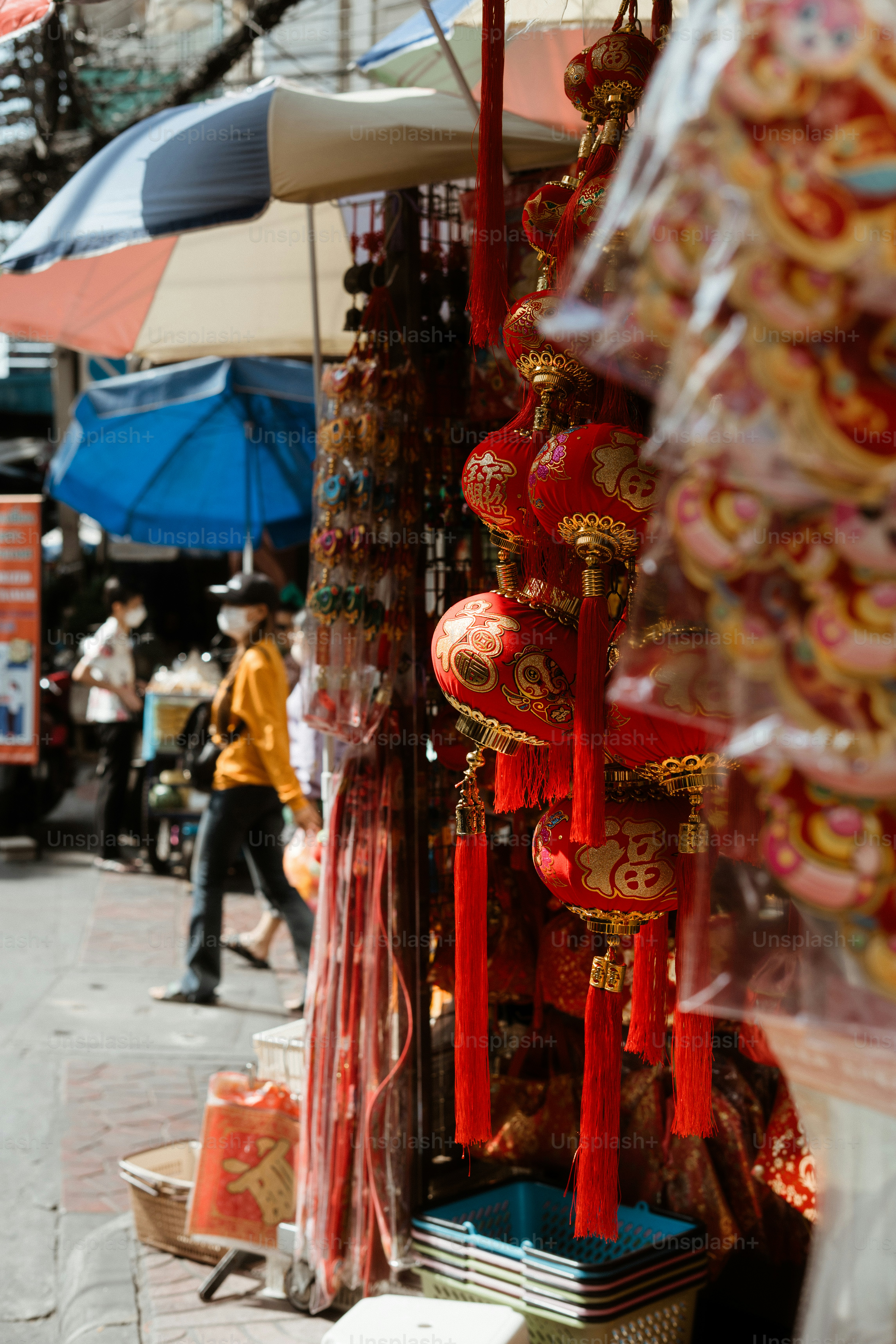 Red chinese lanterns hanging at a vibrant street market