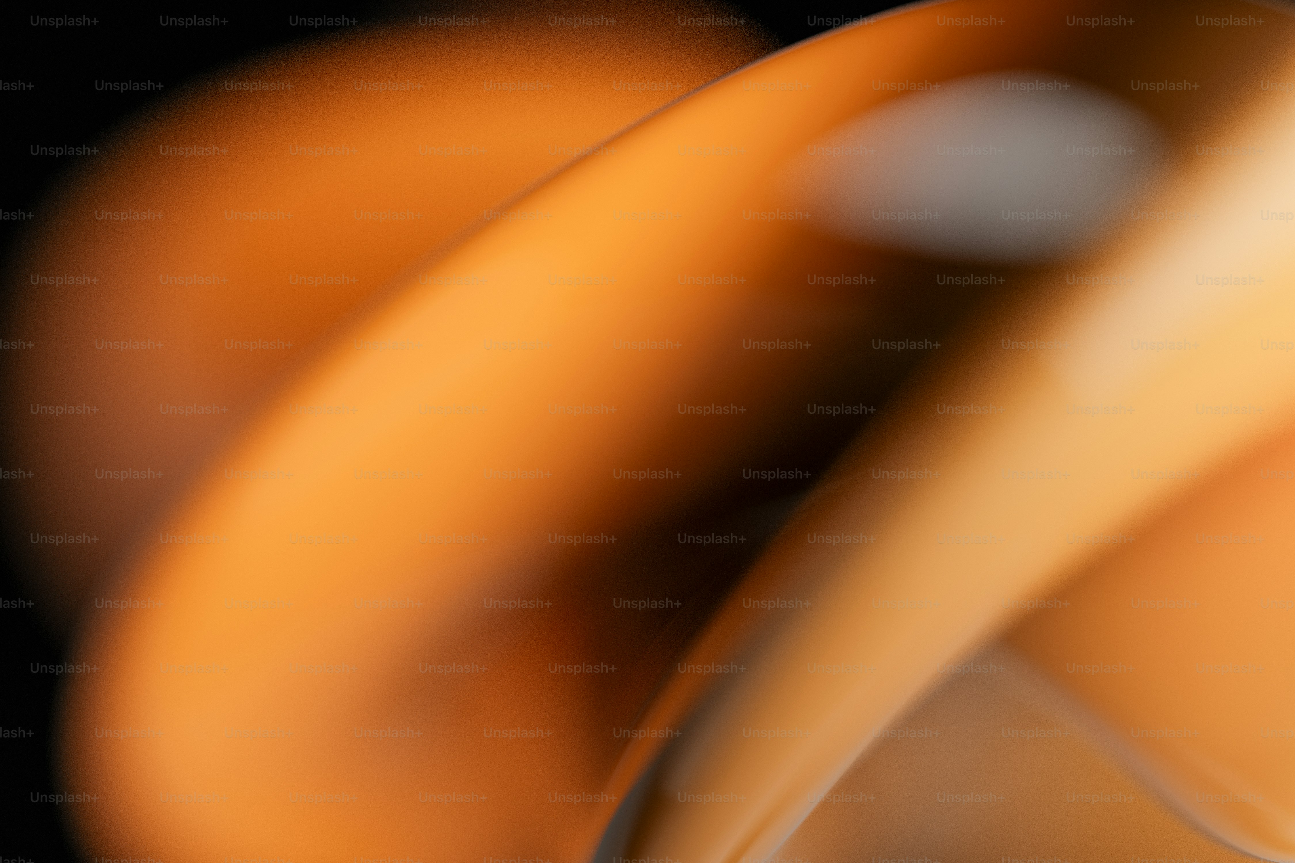 Blurred orange and brown abstract curves