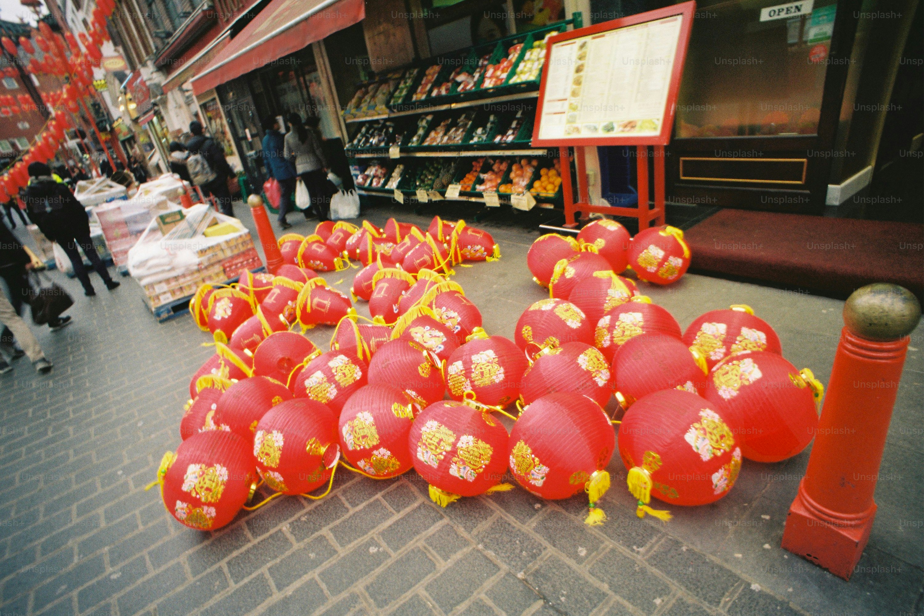 Red and gold chinese lanterns on london chinatown street