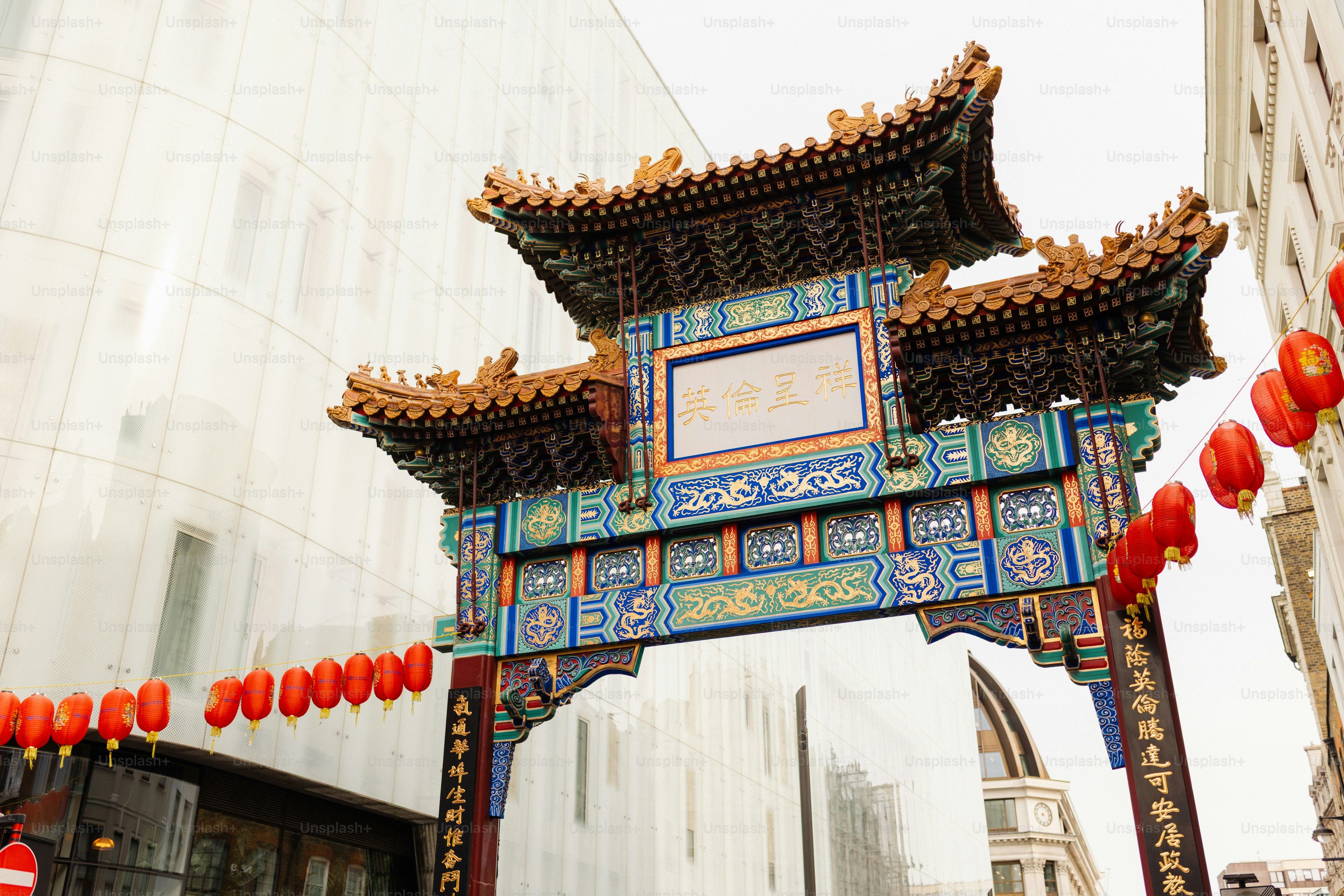 Ornate chinese gate with red lanterns
