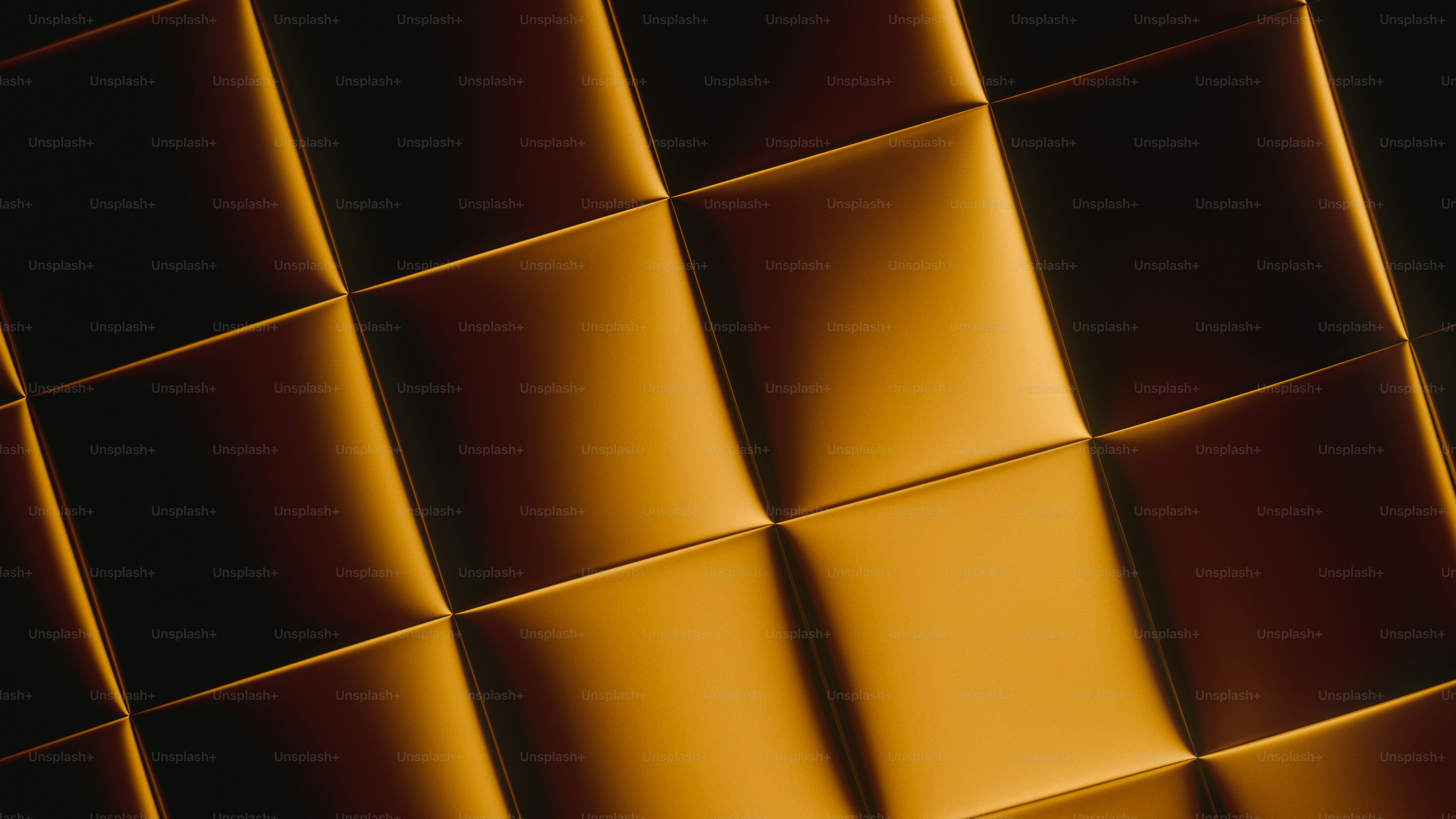 Carrés dorés texturés avec une lumière et une ombre fortes