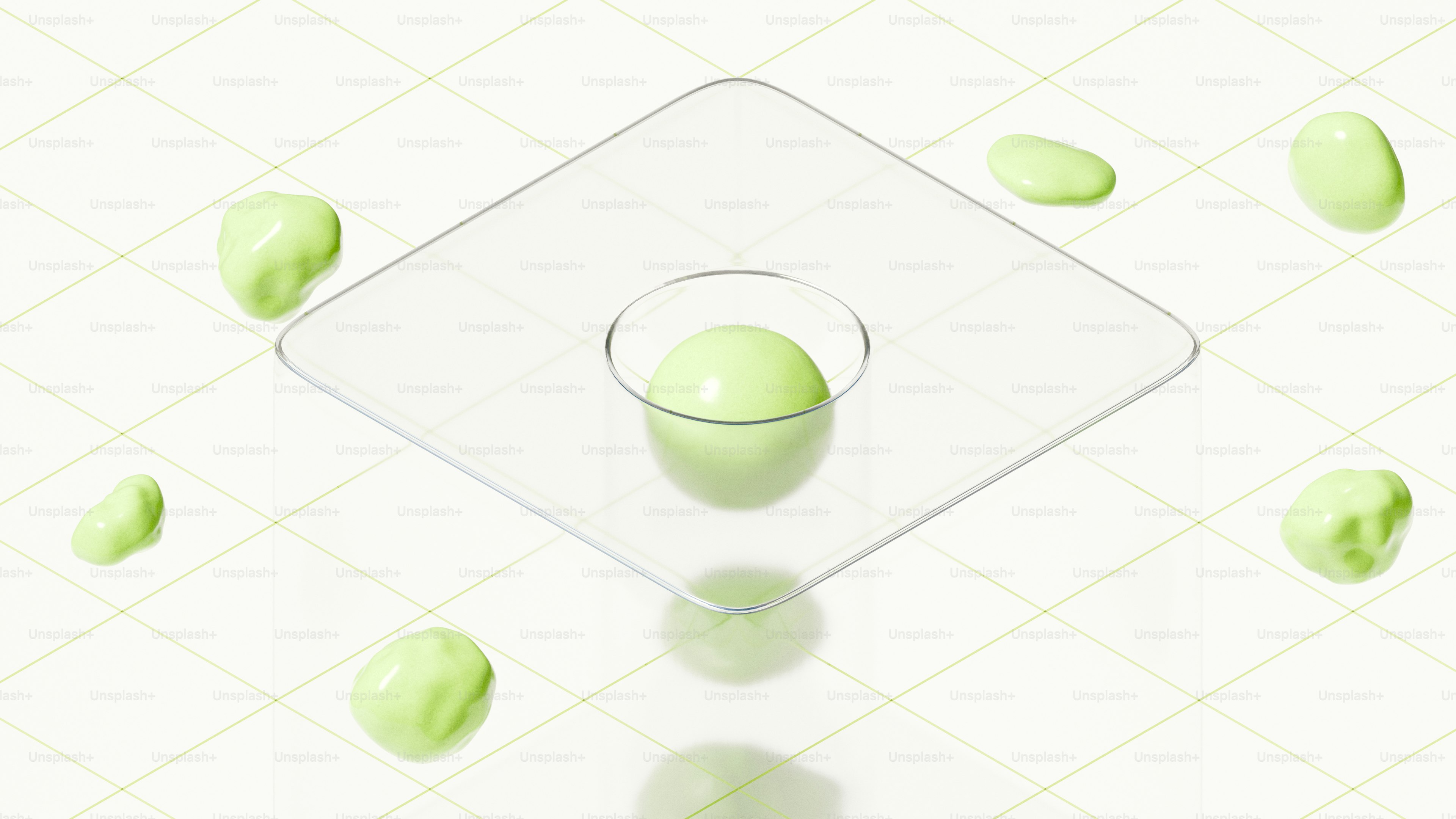 Green spheres and geometric shapes on a grid surface