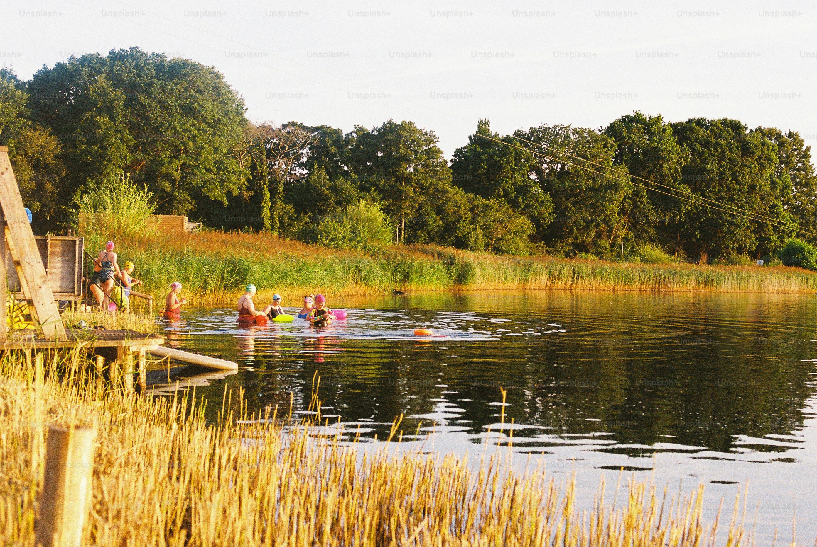 People swimming and relaxing in a lake