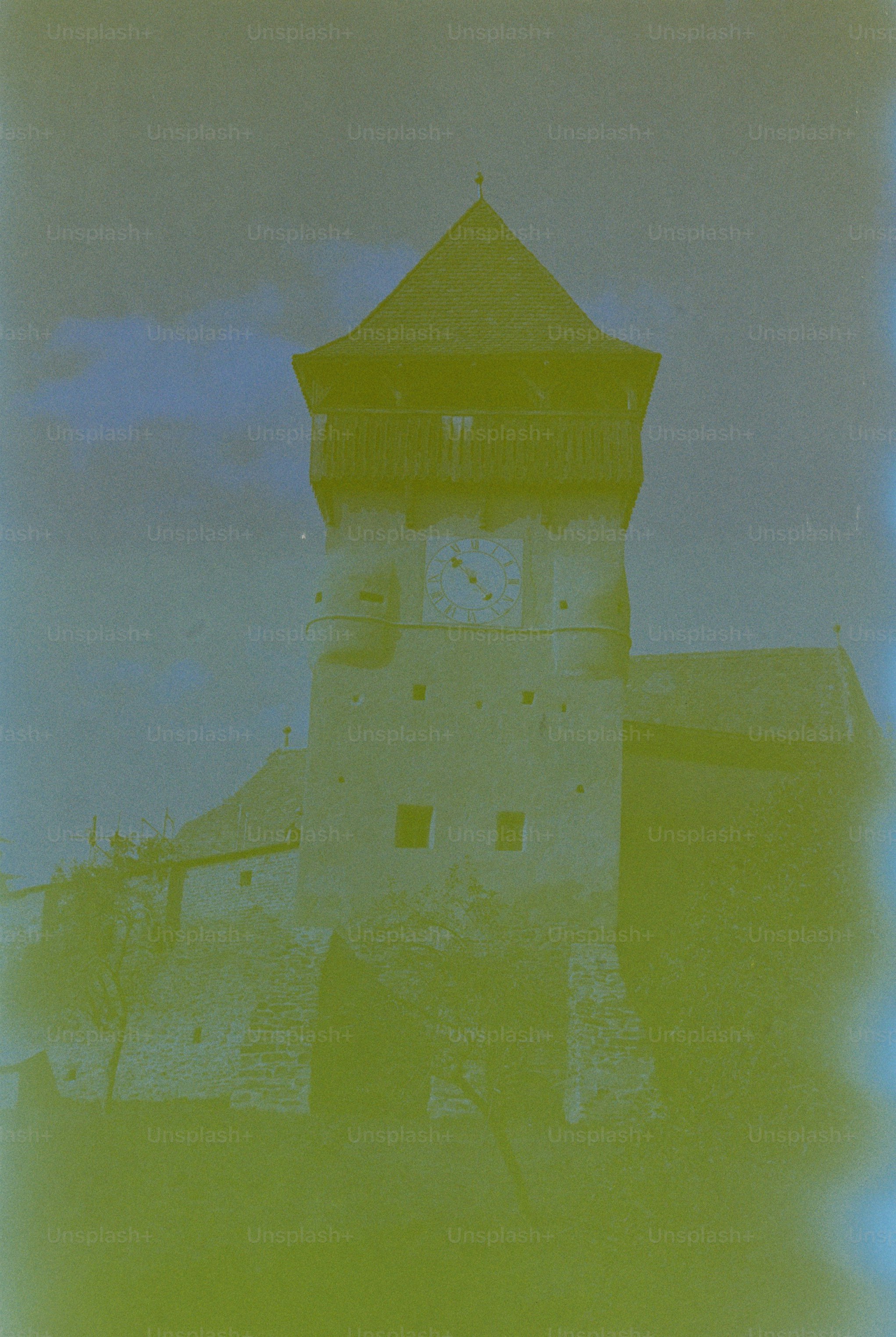 Historic stone tower with pointed roof