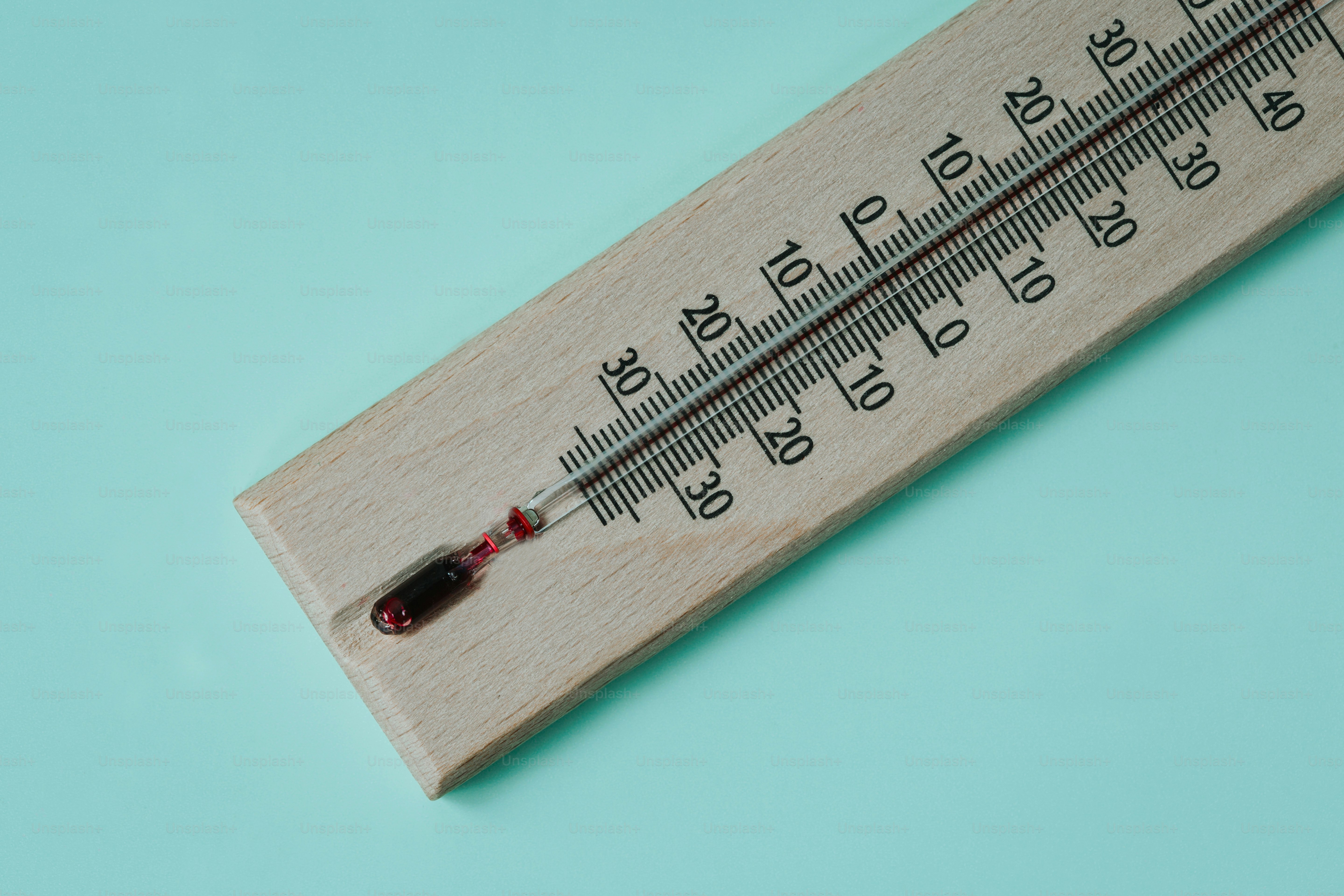 Wooden thermometer showing below zero temperature