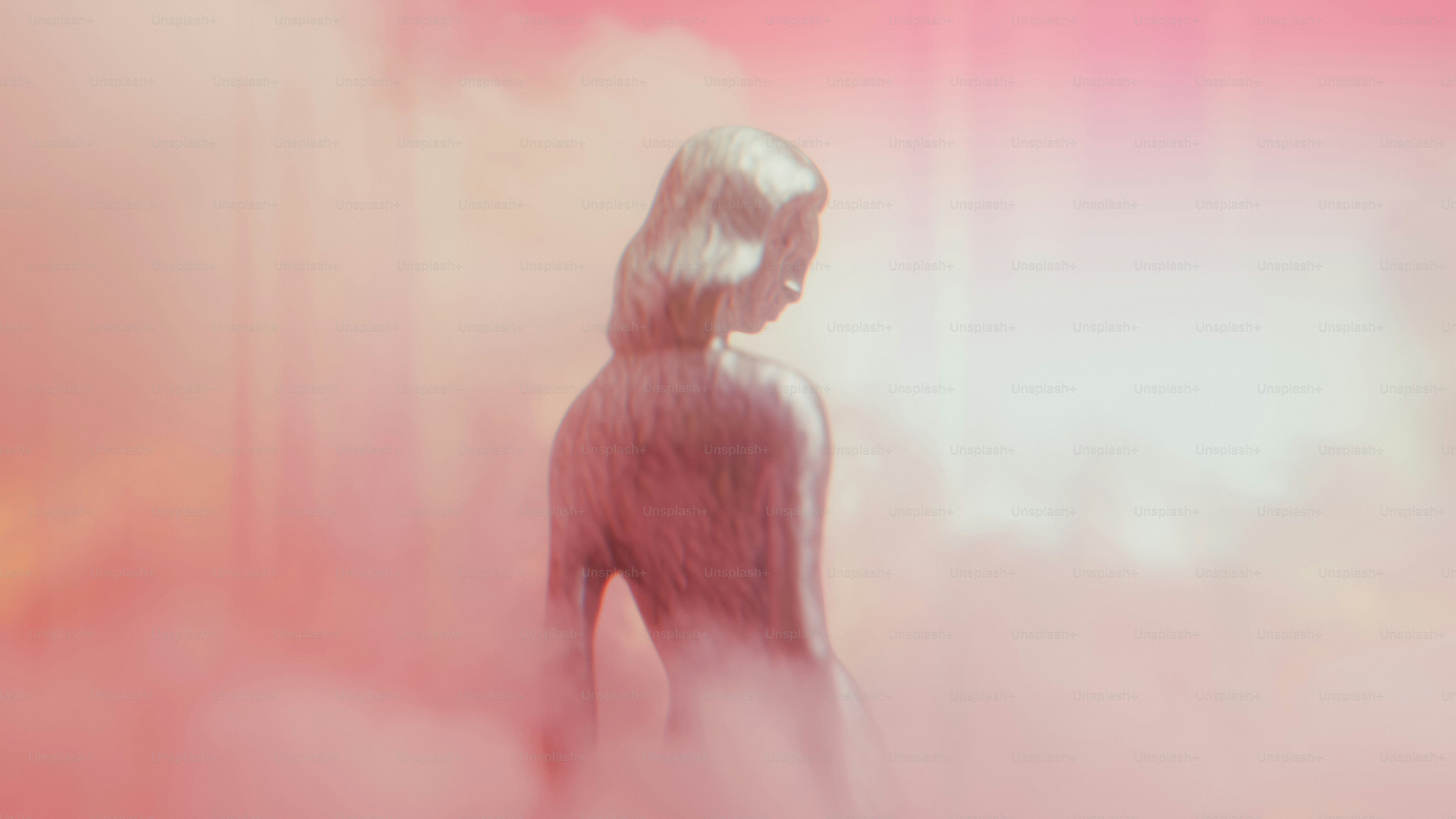 Blurred figure in pink ethereal haze
