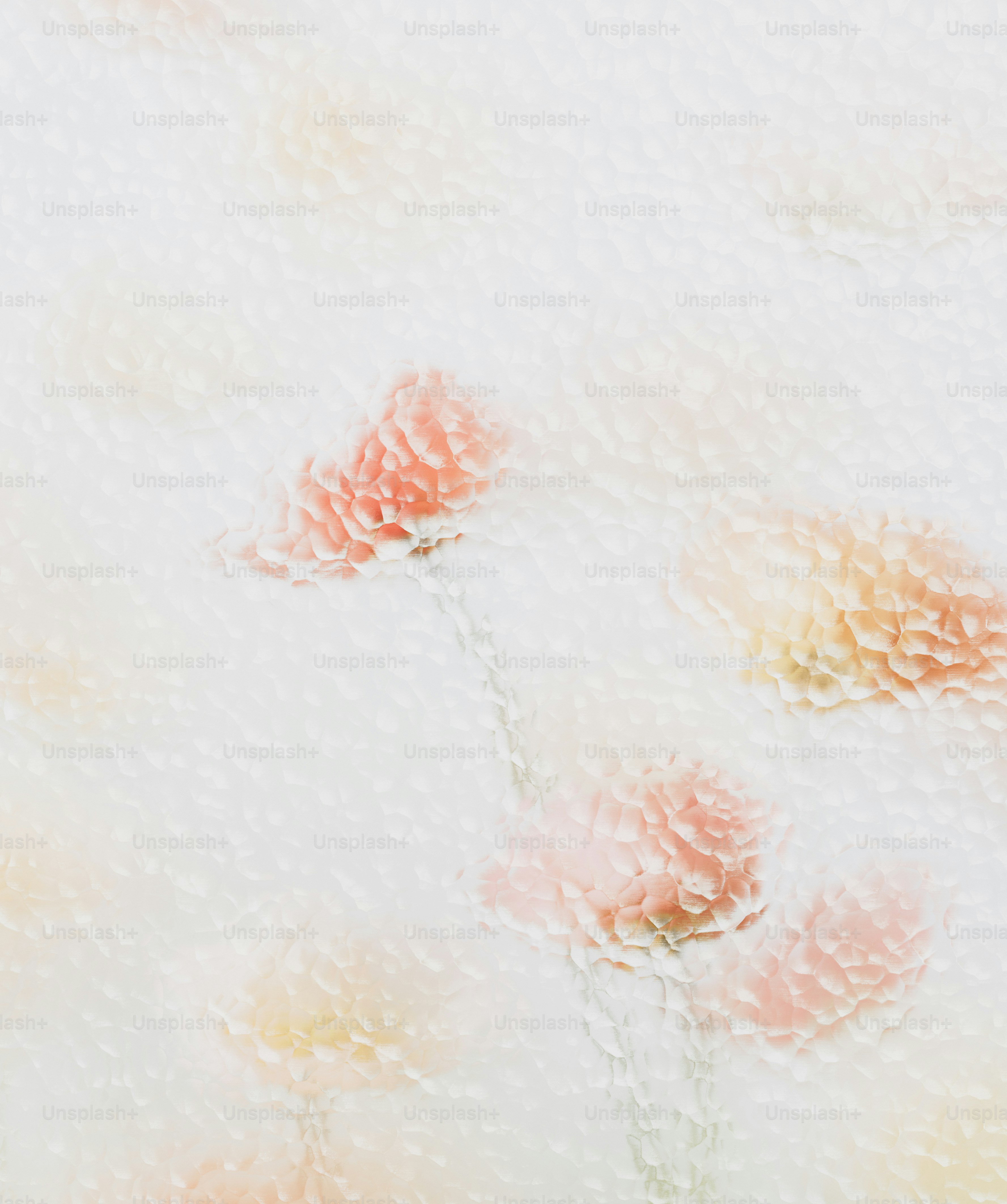 Pink flowers viewed through textured, frosted glass with a soft, diffused light.