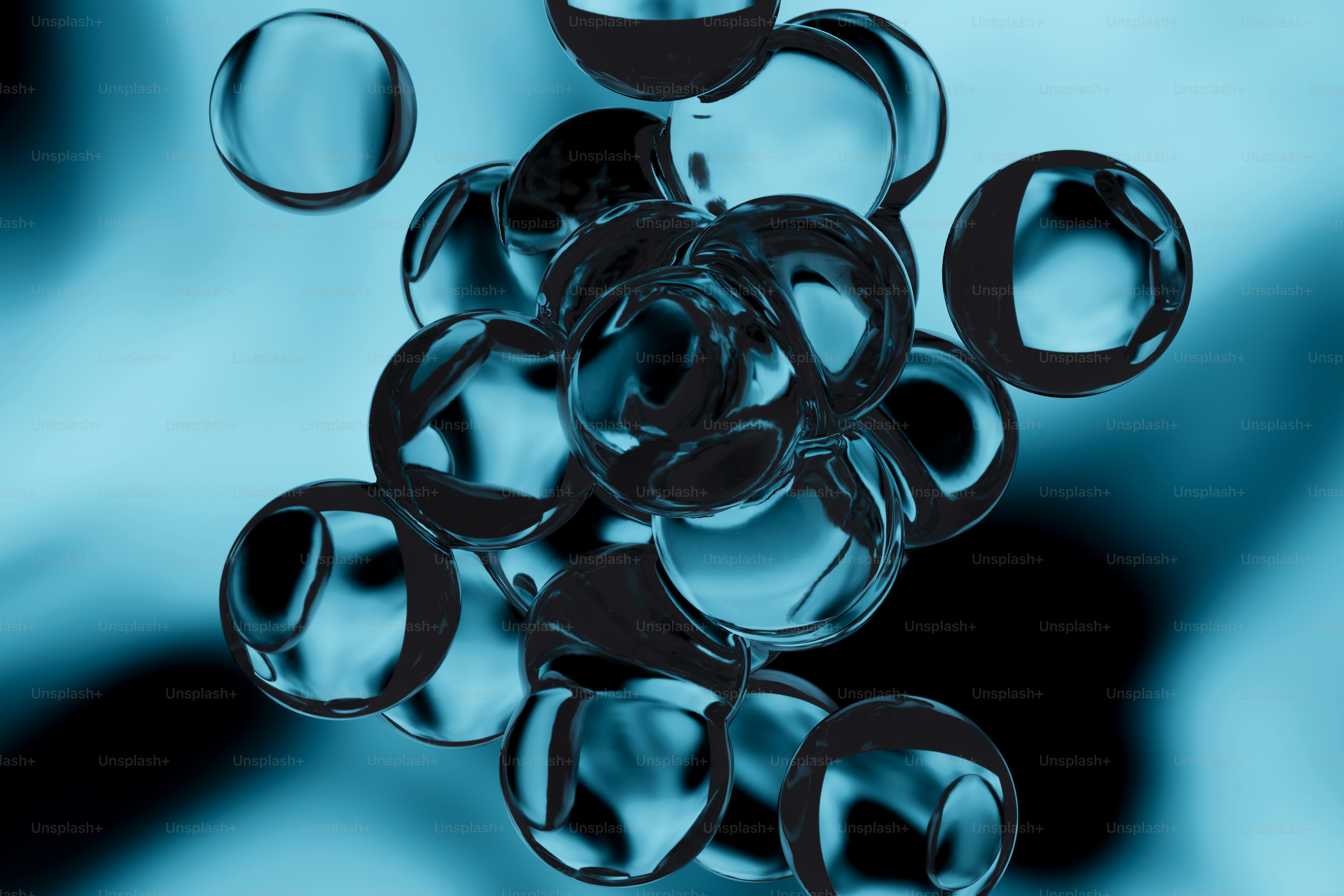 A cluster of translucent blue spheres floating against a soft blue background