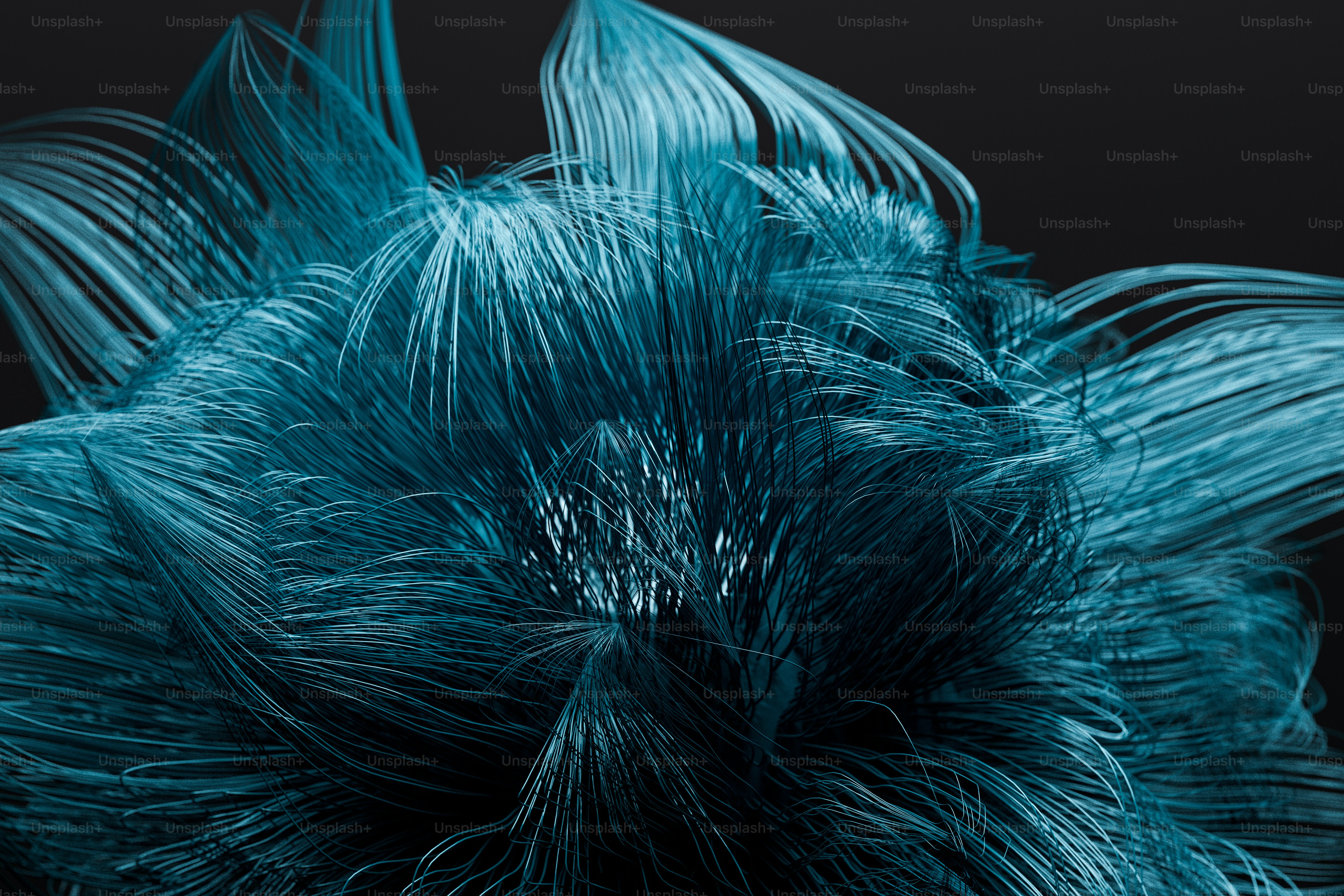 A spherical cluster of thin blue filaments radiating outward against a dark background