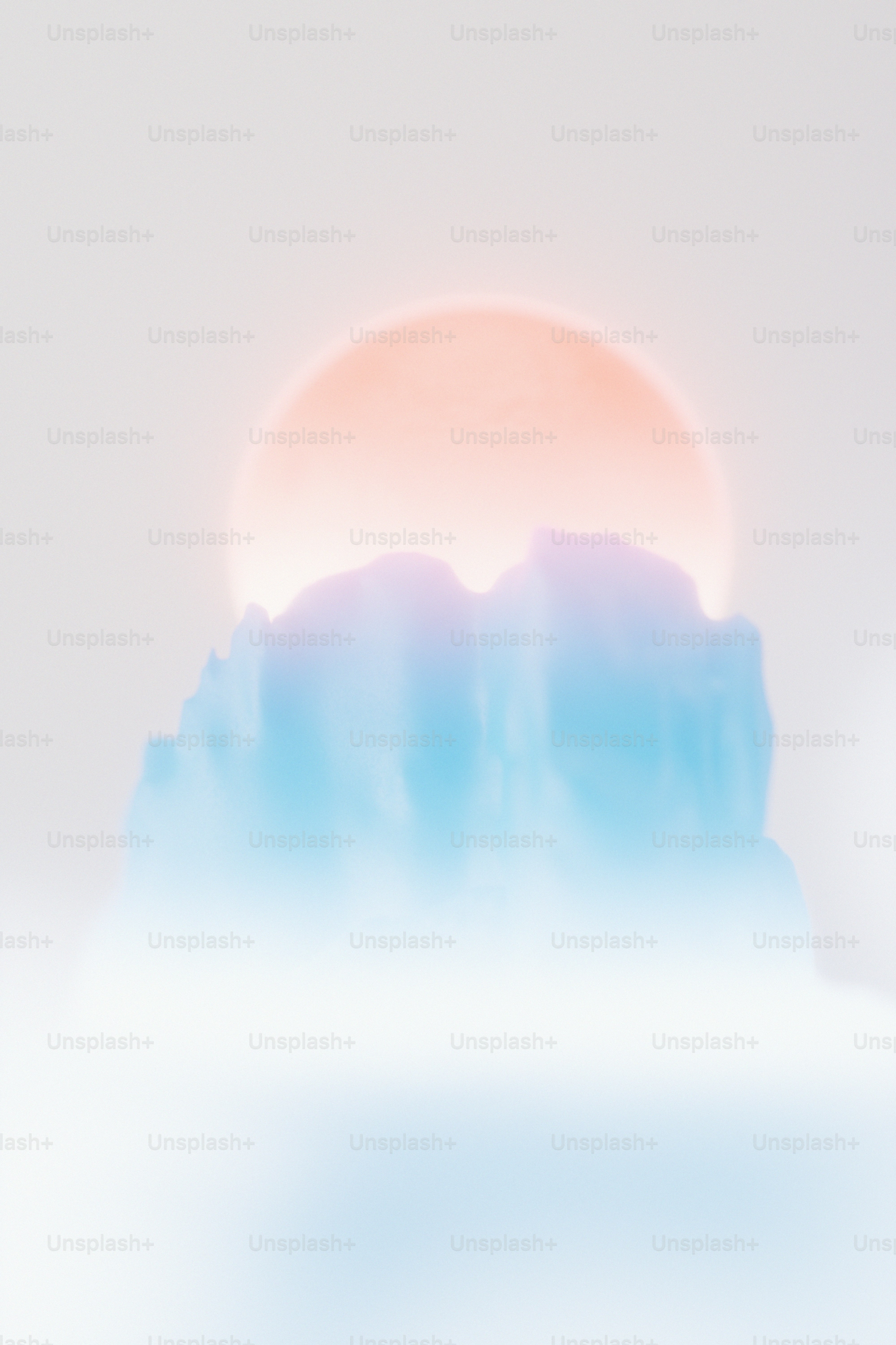 A soft blue mountain silhouette against a pale orange circular light.