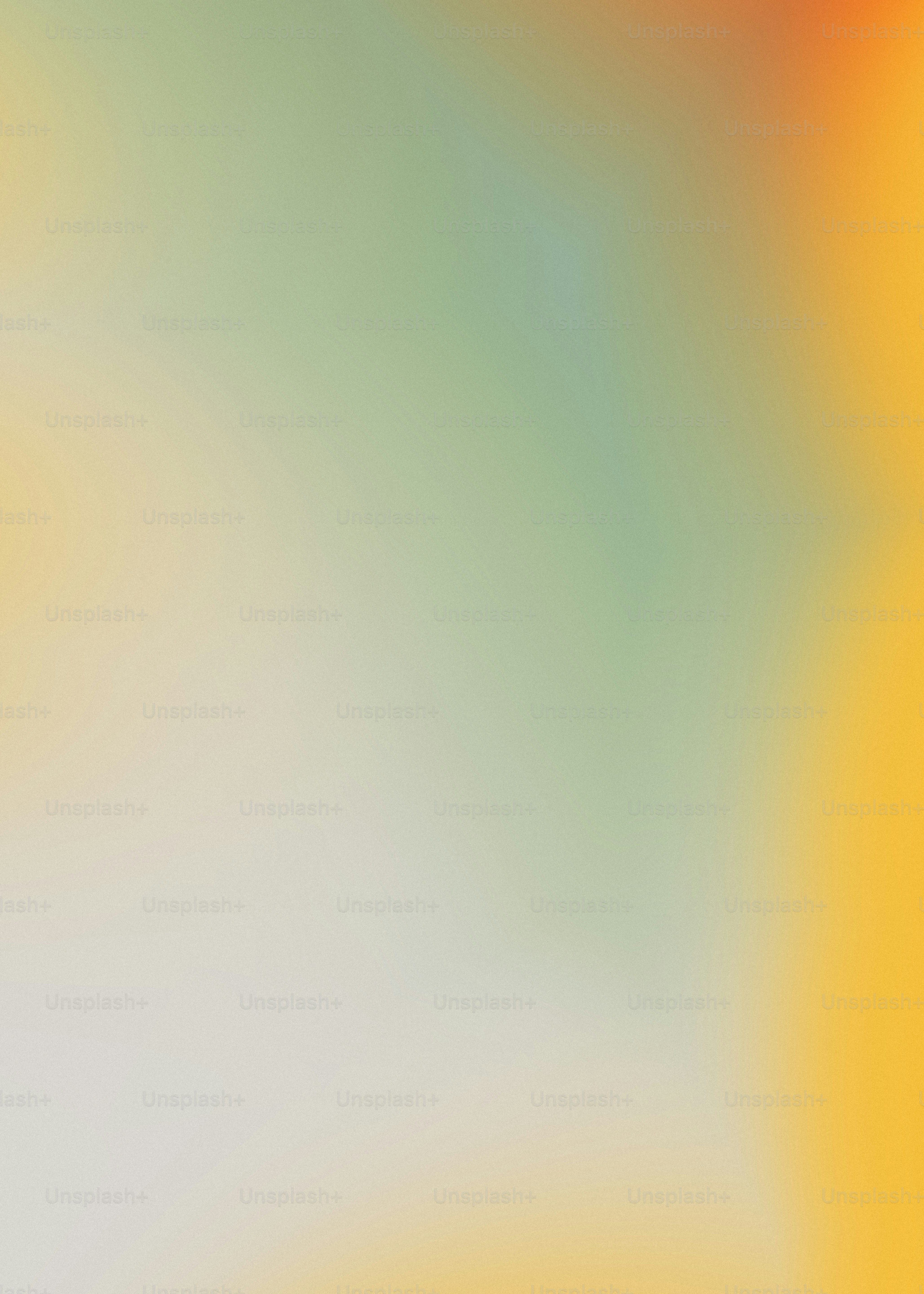 A soft gradient shifting from pale grey to muted green and warm yellow.