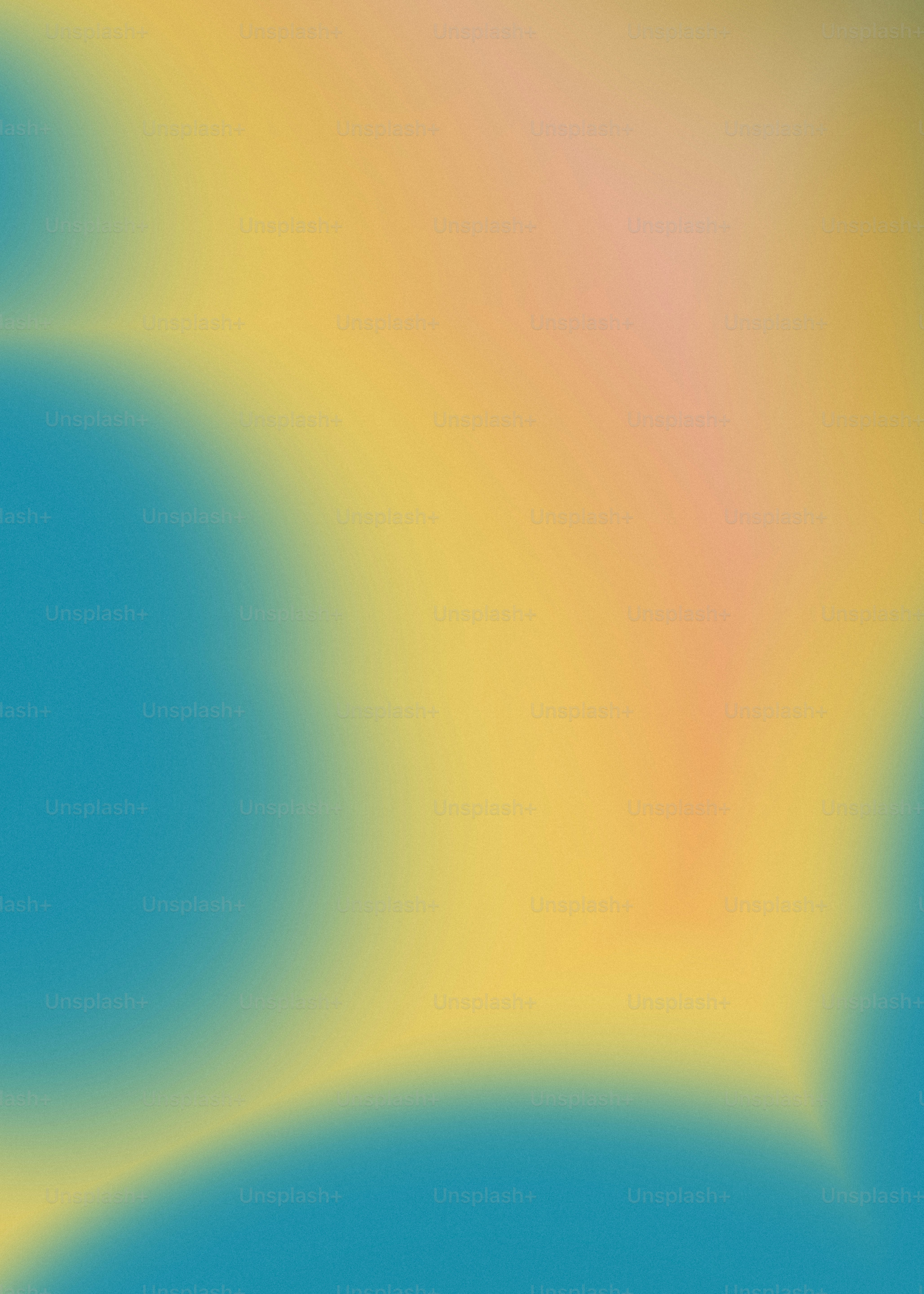 A soft gradient shifting from teal to yellow and pale pink.