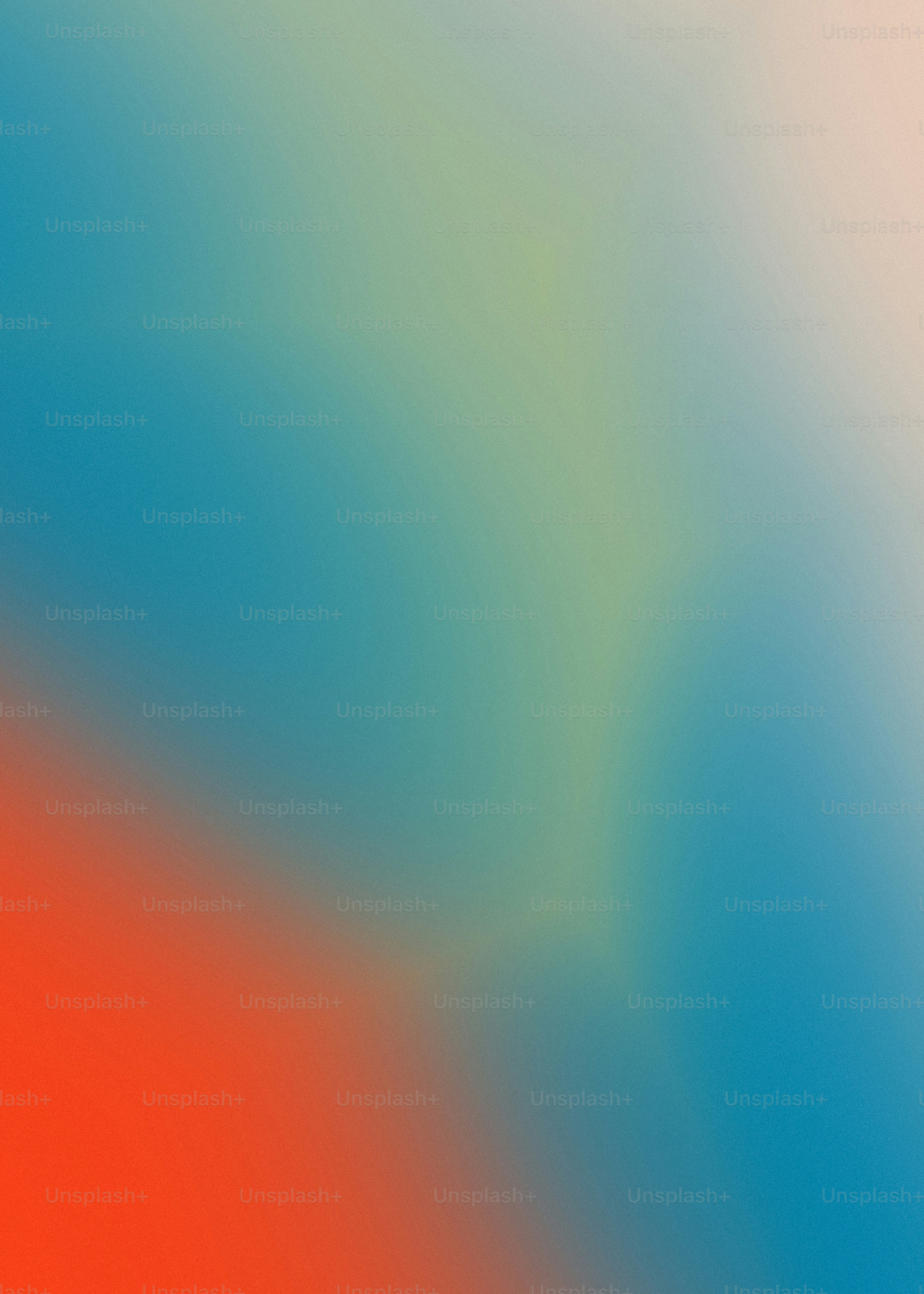 A smooth gradient shifting from vibrant orange to teal and pale yellow.
