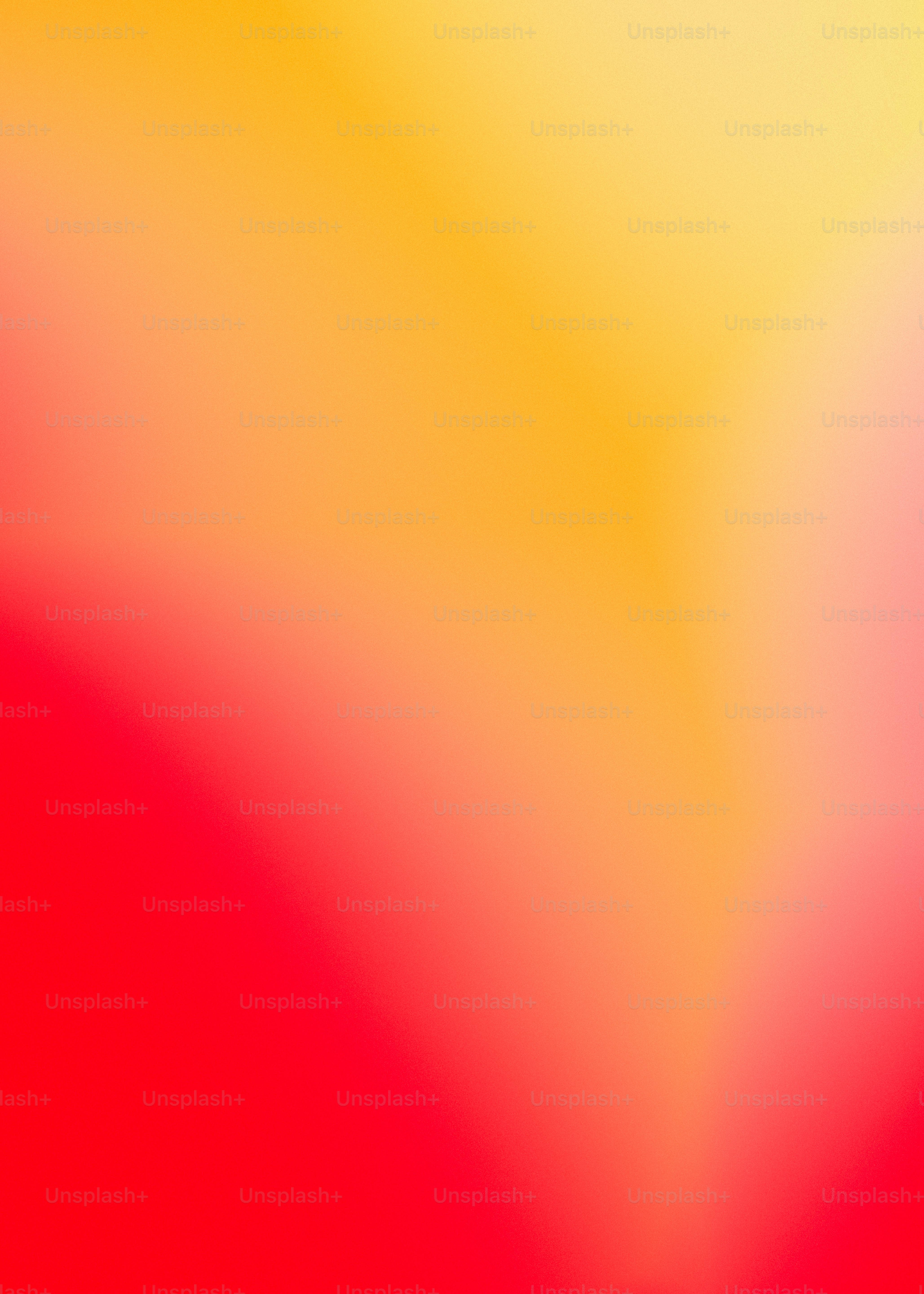 A soft gradient shifting from vibrant red to warm yellow.