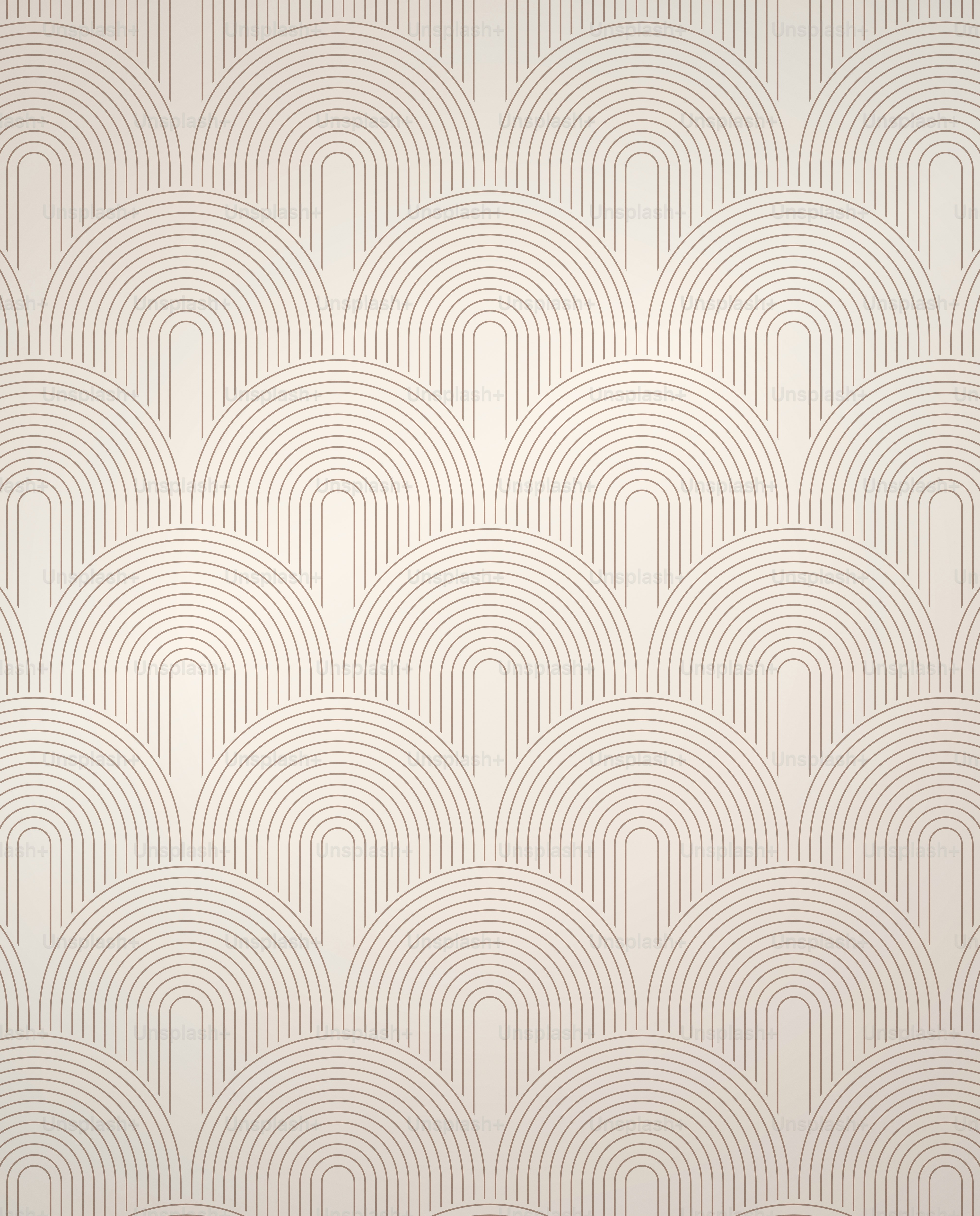 A seamless pattern of repeating brown arched lines on a light beige background.