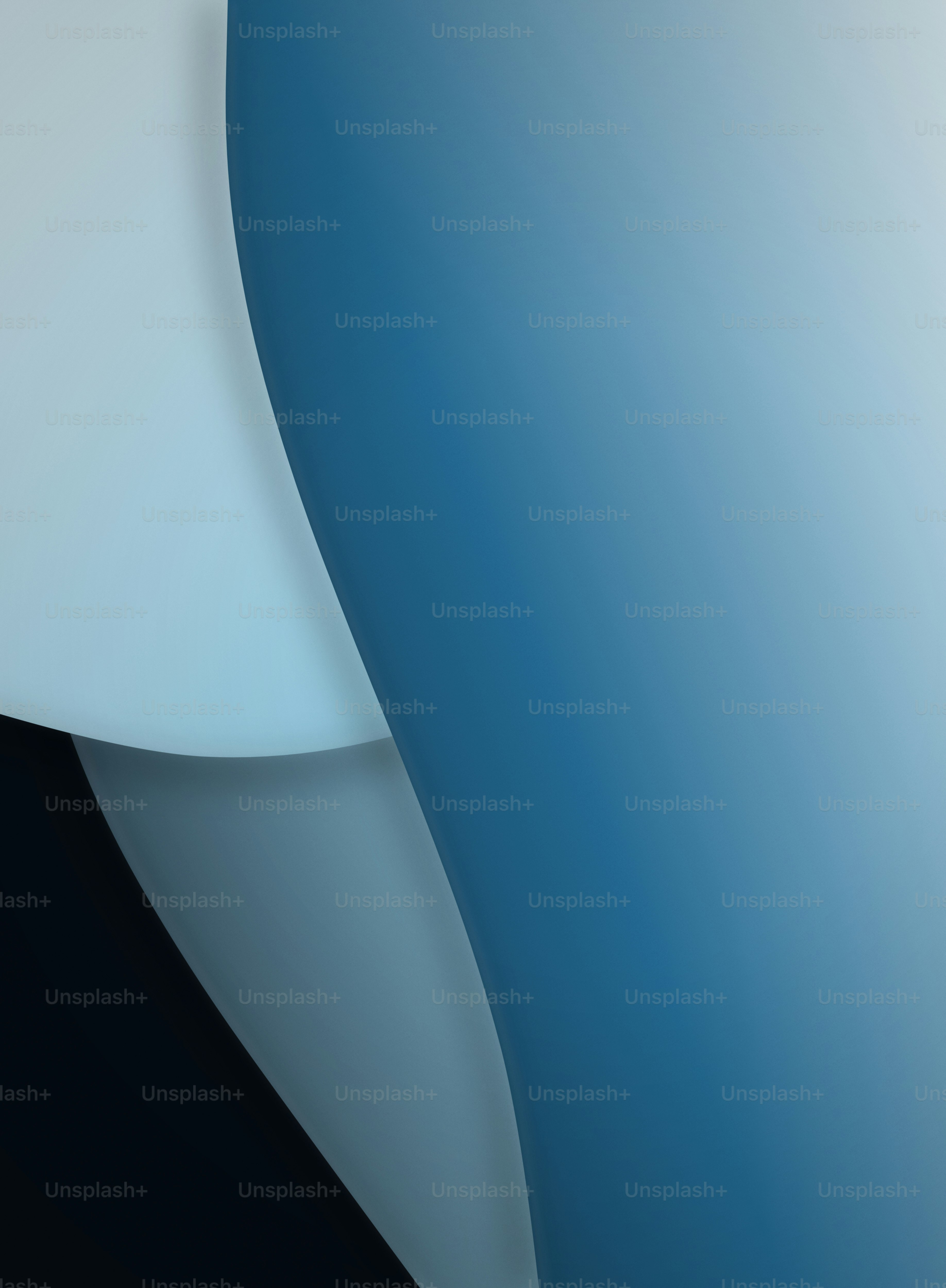 Abstract overlapping curves in shades of light blue, deep blue, and dark navy.
