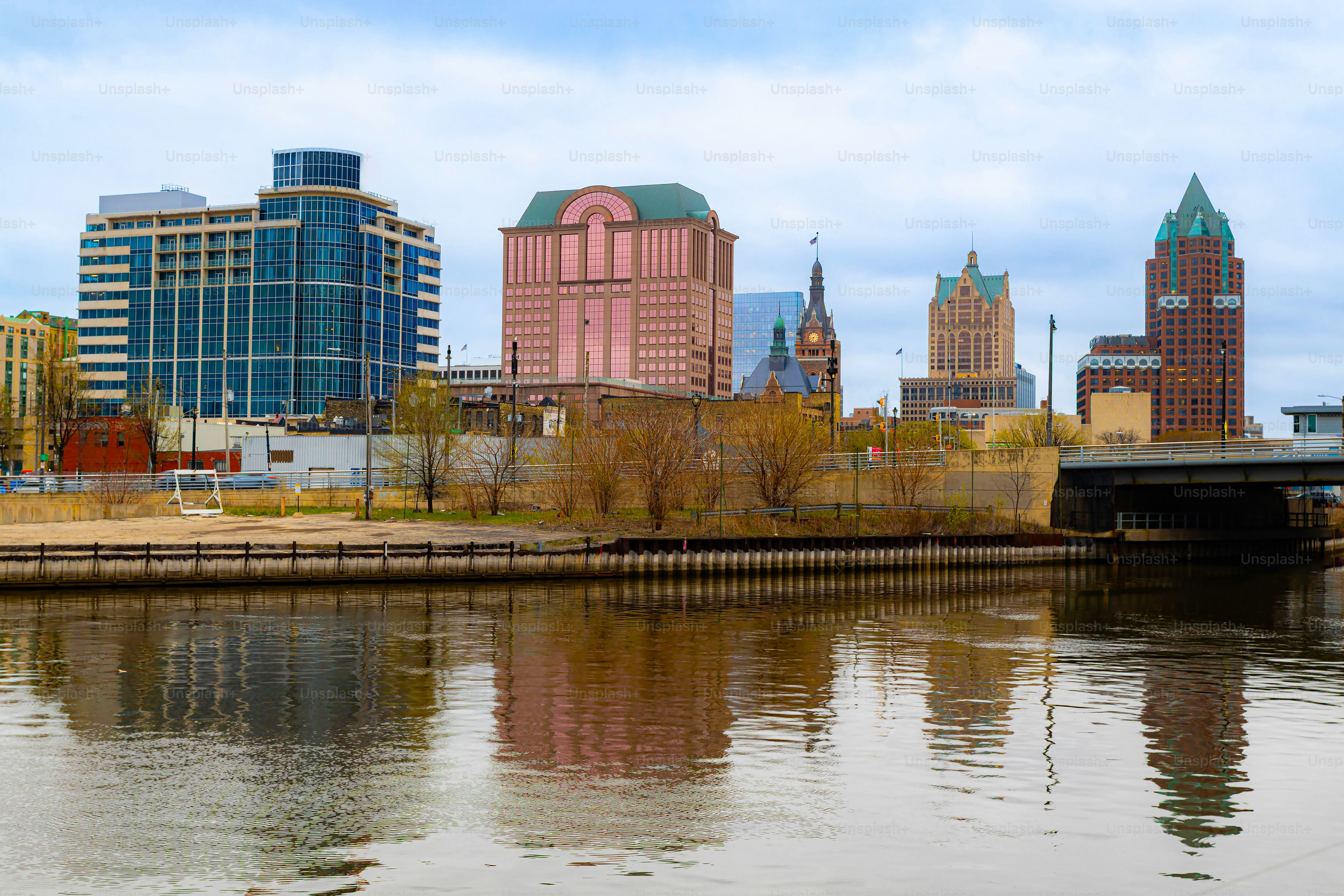 Milwaukee Skyline from City Center Milwaukee River at summer day