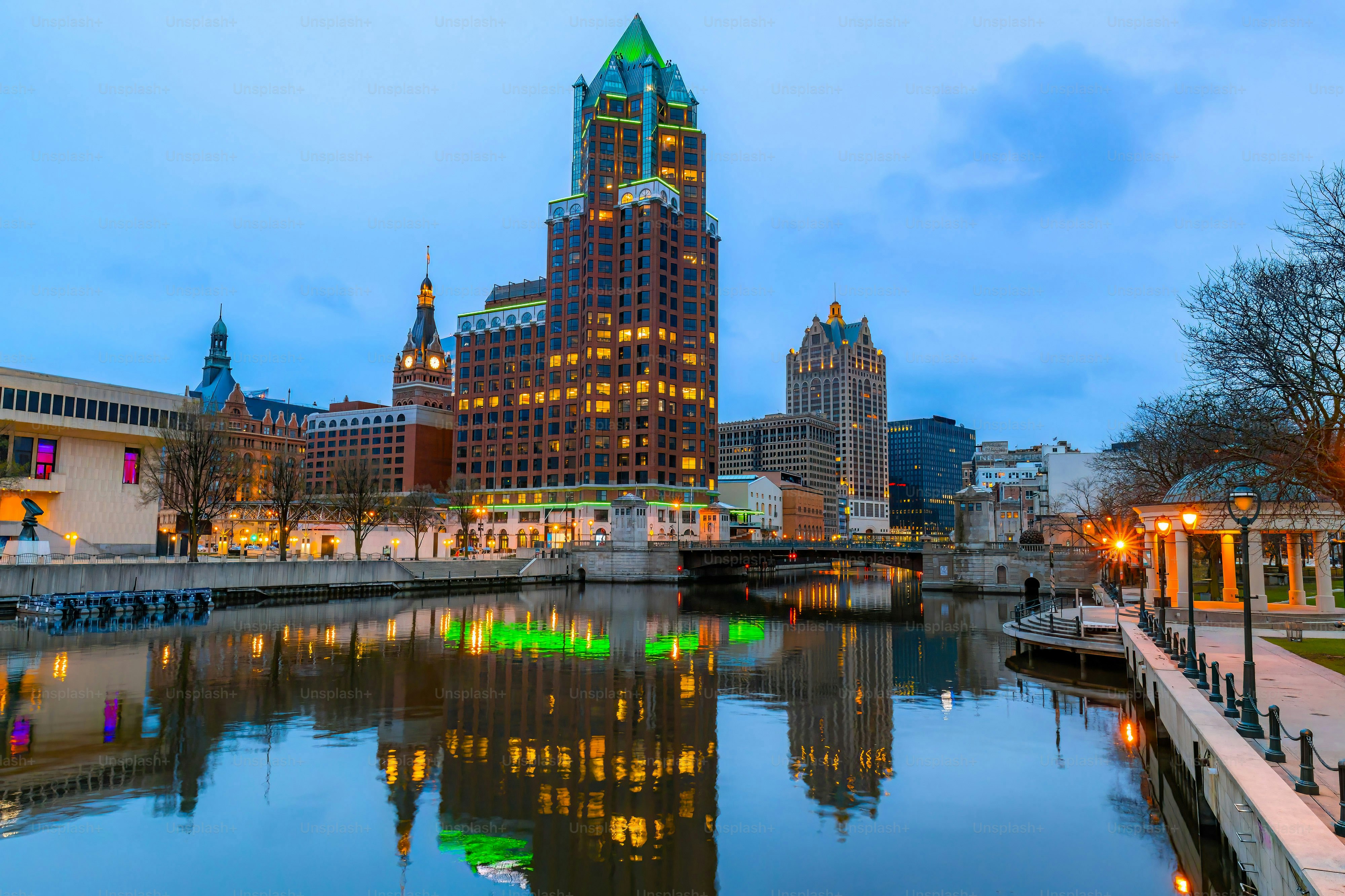 Milwaukee Downtown Illuminated at Night Reflecting in Milwaukee River