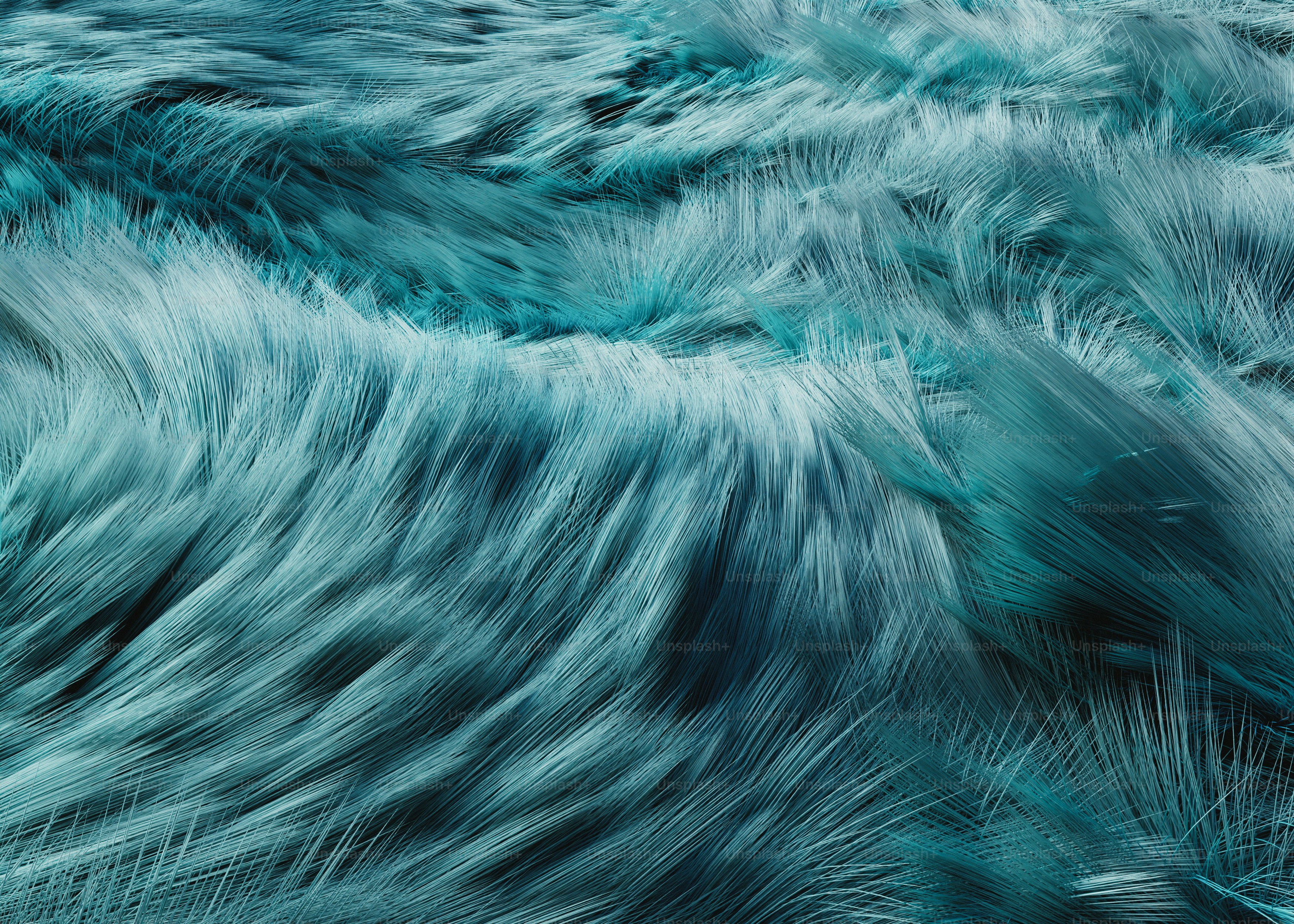 Wavy teal fur texture with long strands flowing in a single direction