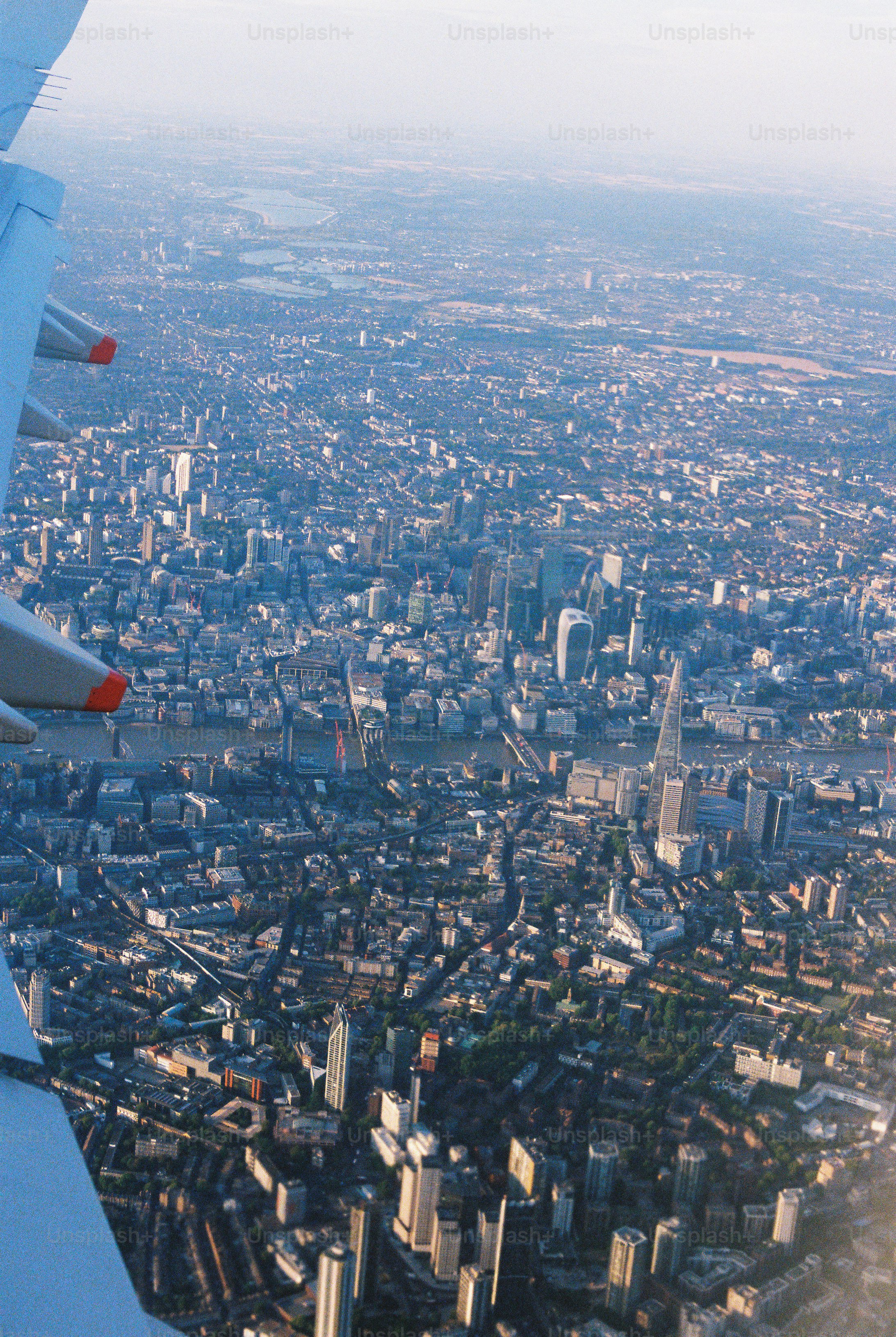 Aerial view of London with the River Thames and The Shard from an airplane