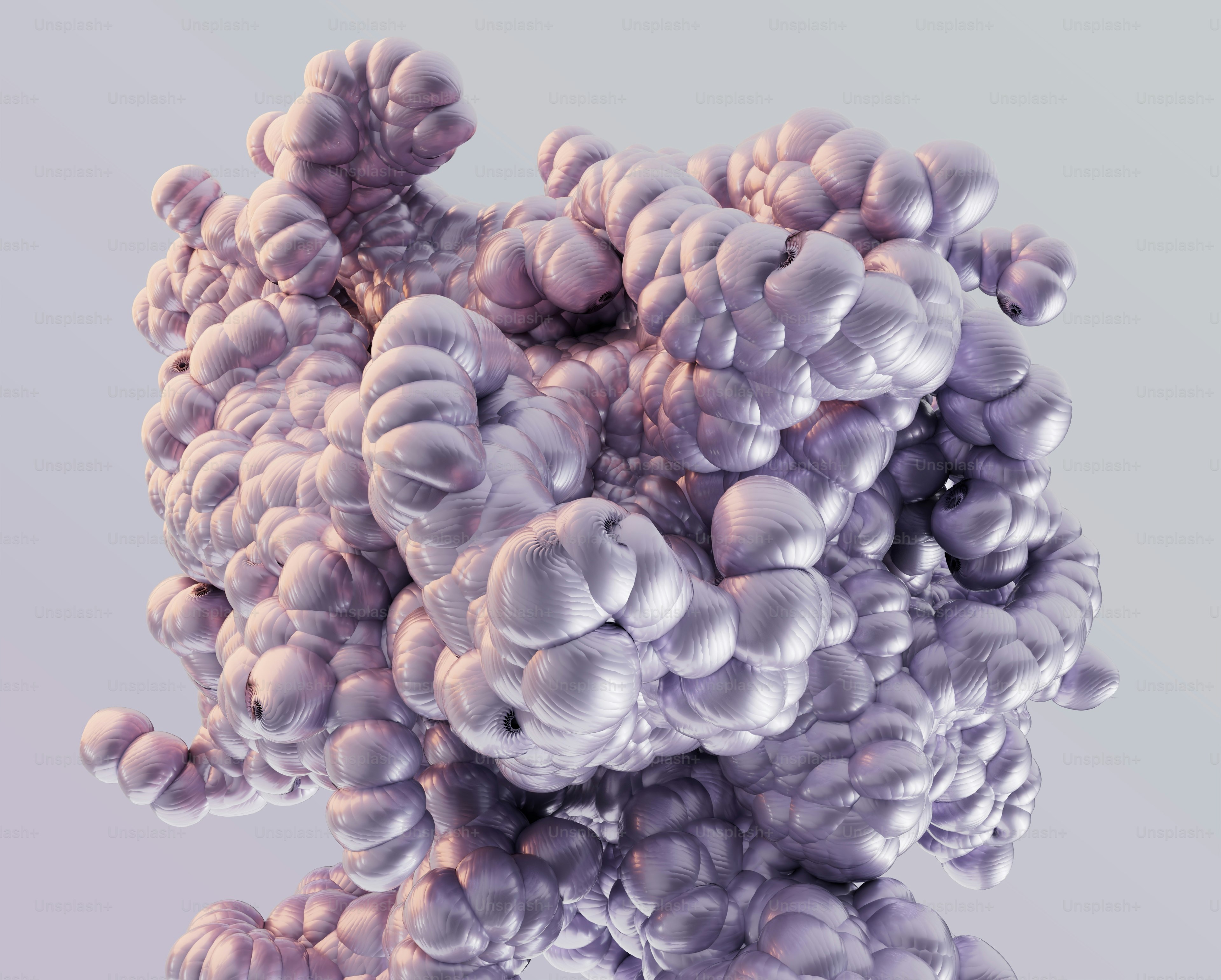 A cluster of smooth lavender spheres with subtle folds against a light background