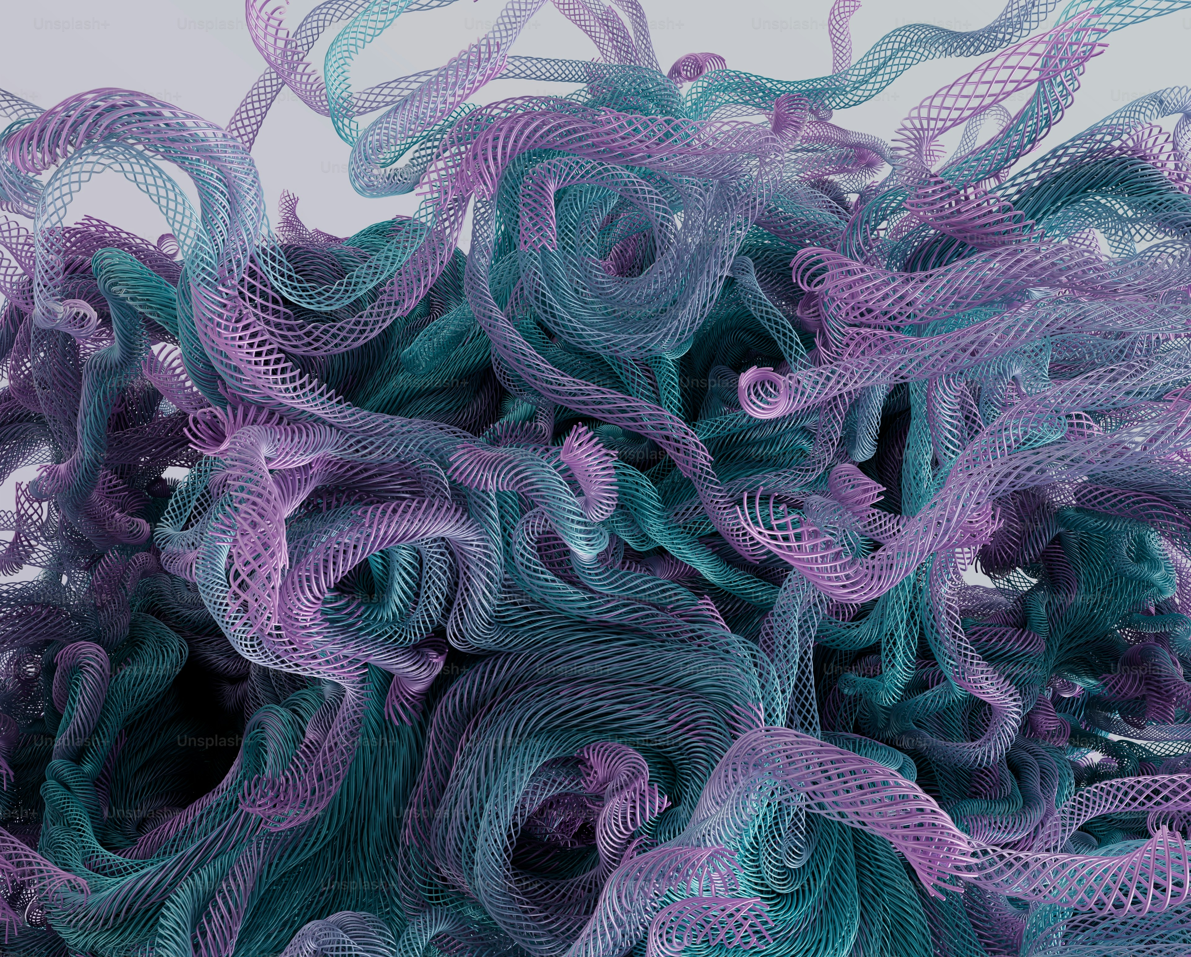 A dense tangle of purple and teal mesh ribbons against a light background