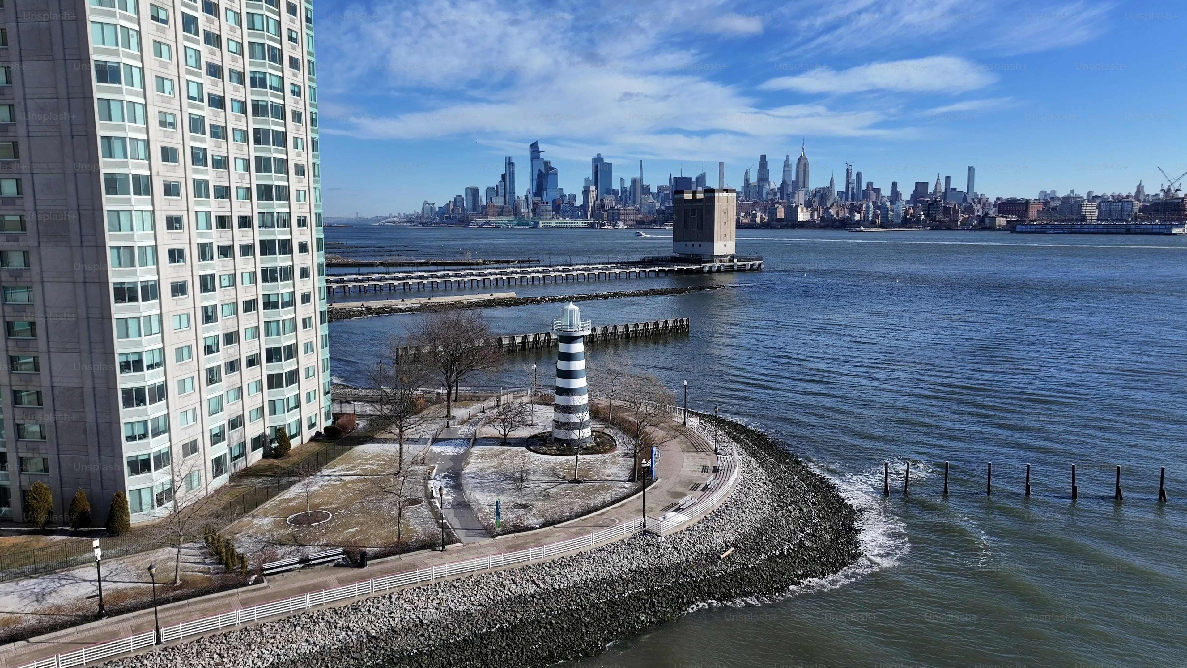 Lighthouse Point At Jersey City In New Jersey United States. Highrise Buildings Scenery. Downtown New York. Lighthouse Point At New Jersey United States. Coastline Landscape.
