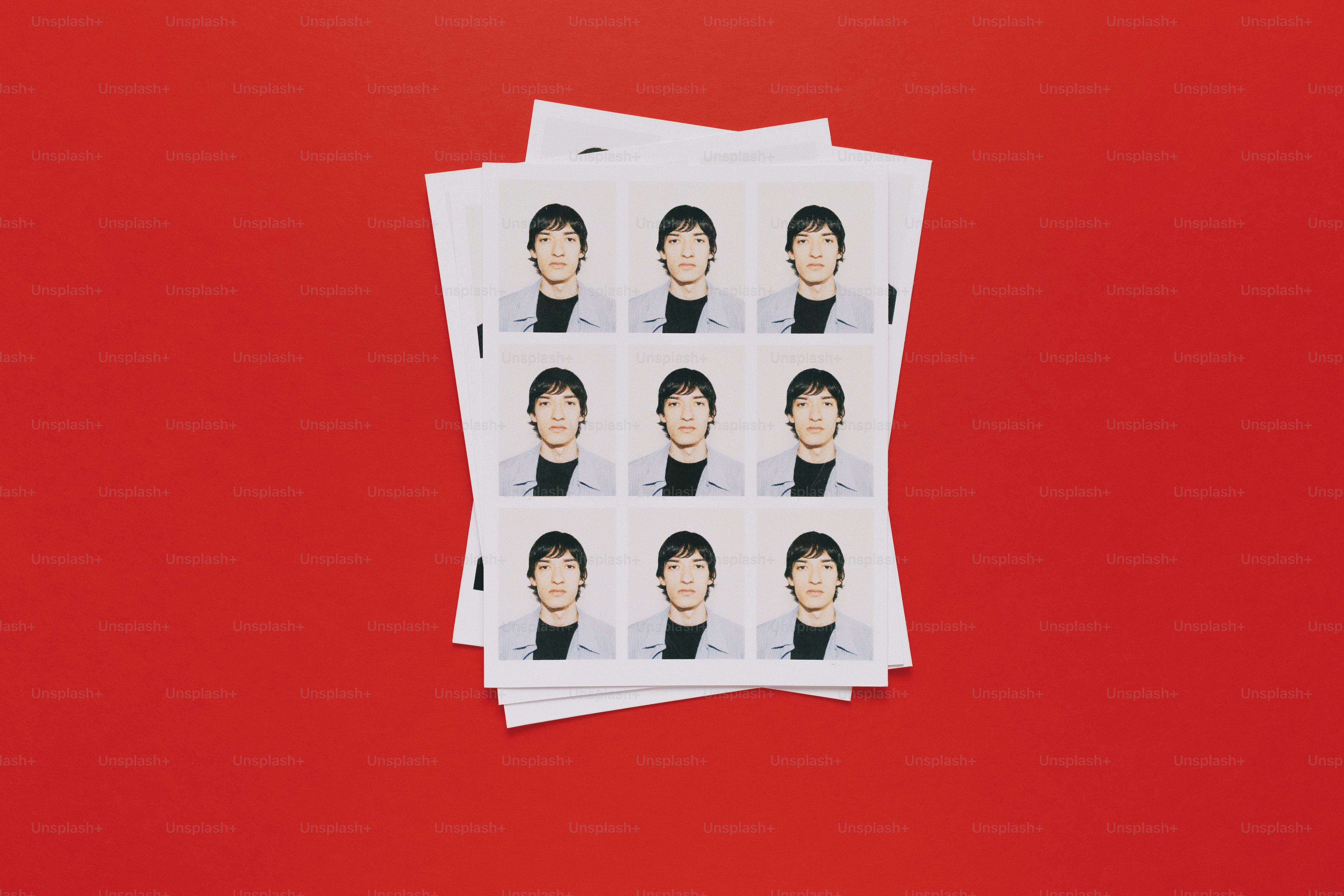A sheet of nine identical passport photos of a man on red background