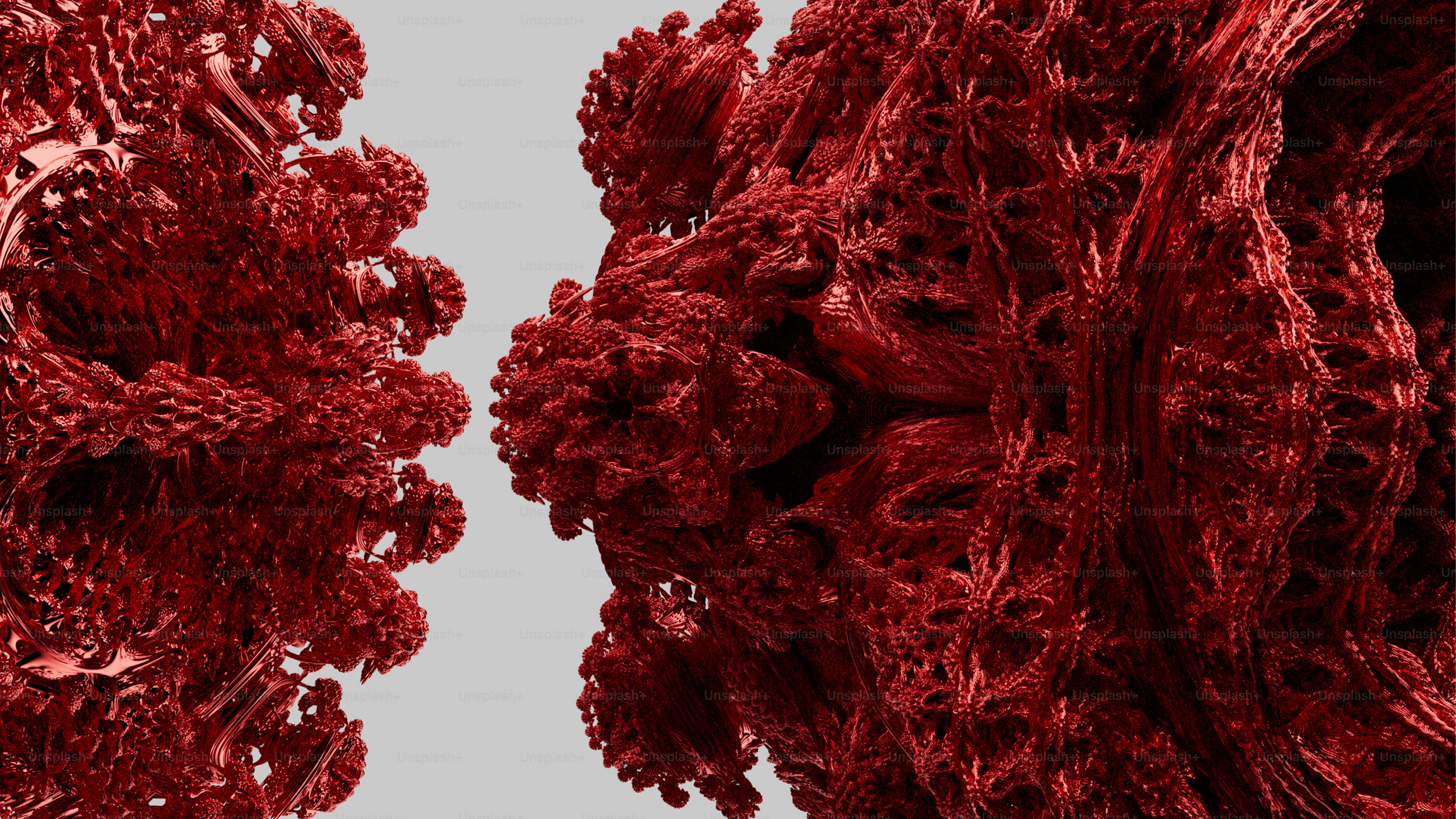 A complex red fractal structure with intricate branching patterns against a light grey background