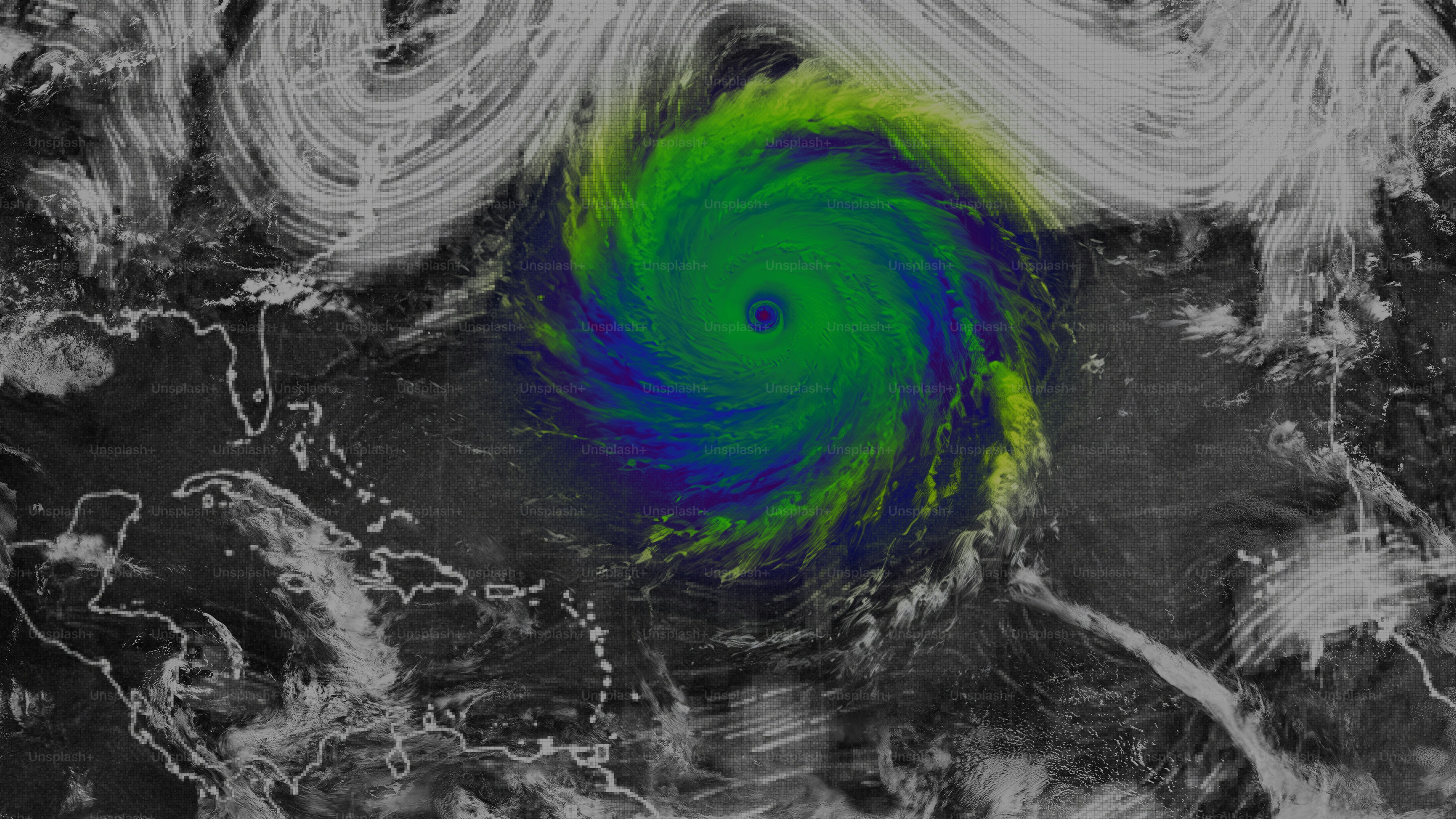 A satellite view of a swirling tropical cyclone over the Atlantic Ocean
