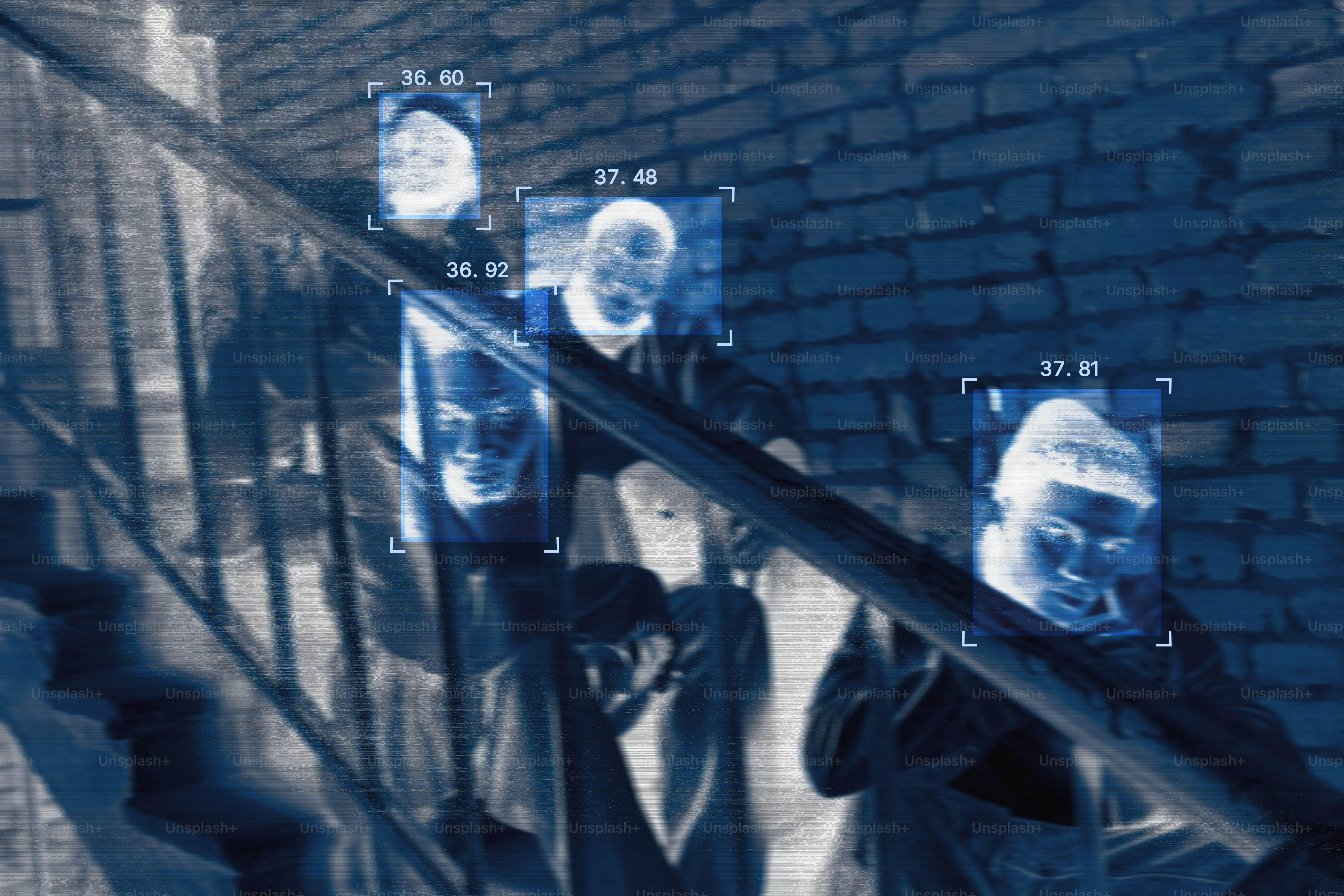 Four people on a staircase with blue digital facial recognition boxes and numerical data