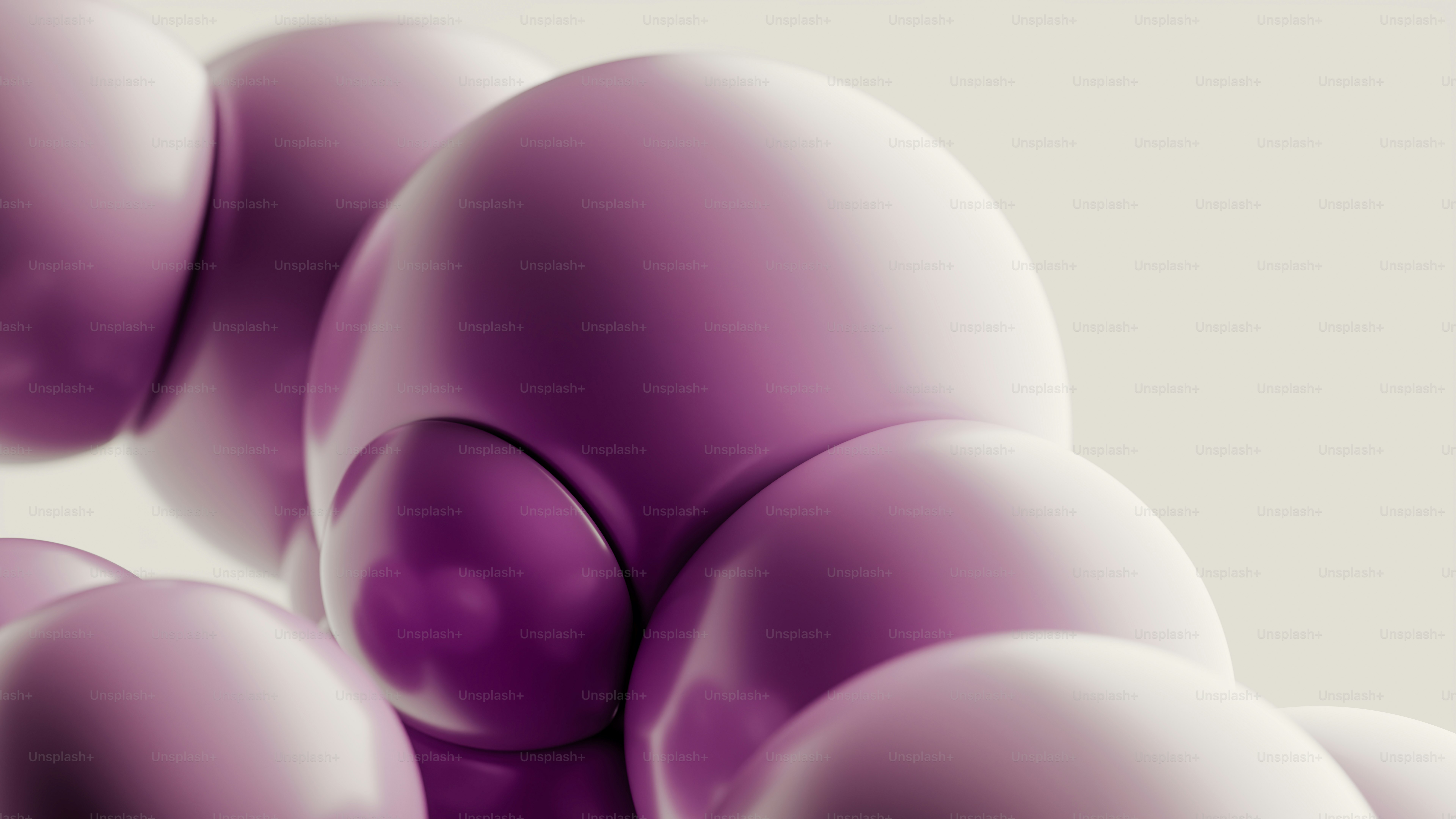 A cluster of smooth glossy purple spheres against a light grey background