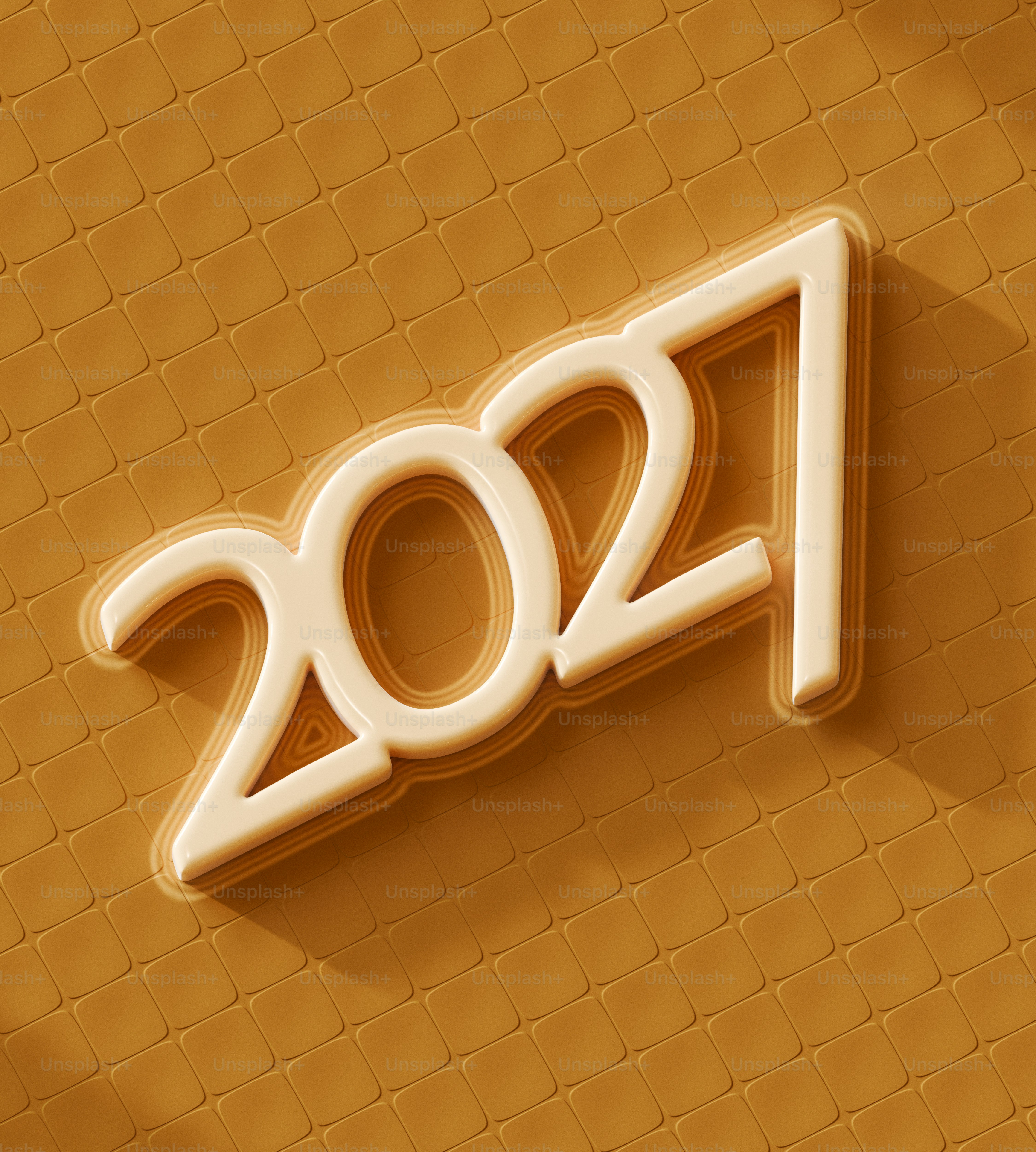 The number 2027 in raised cream-colored lettering on a textured golden background