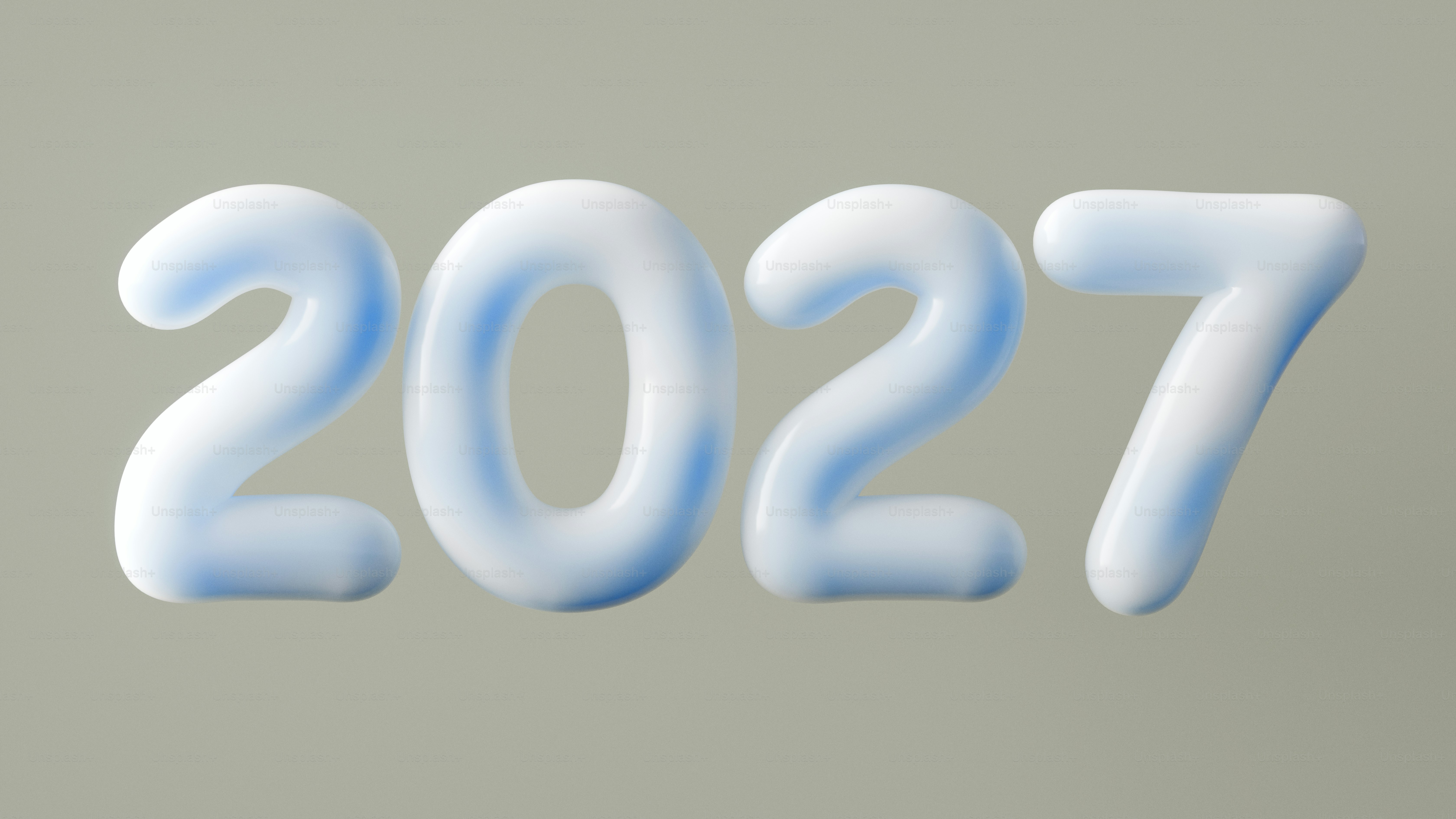 The number 2027 in glossy white and blue inflated balloon letters