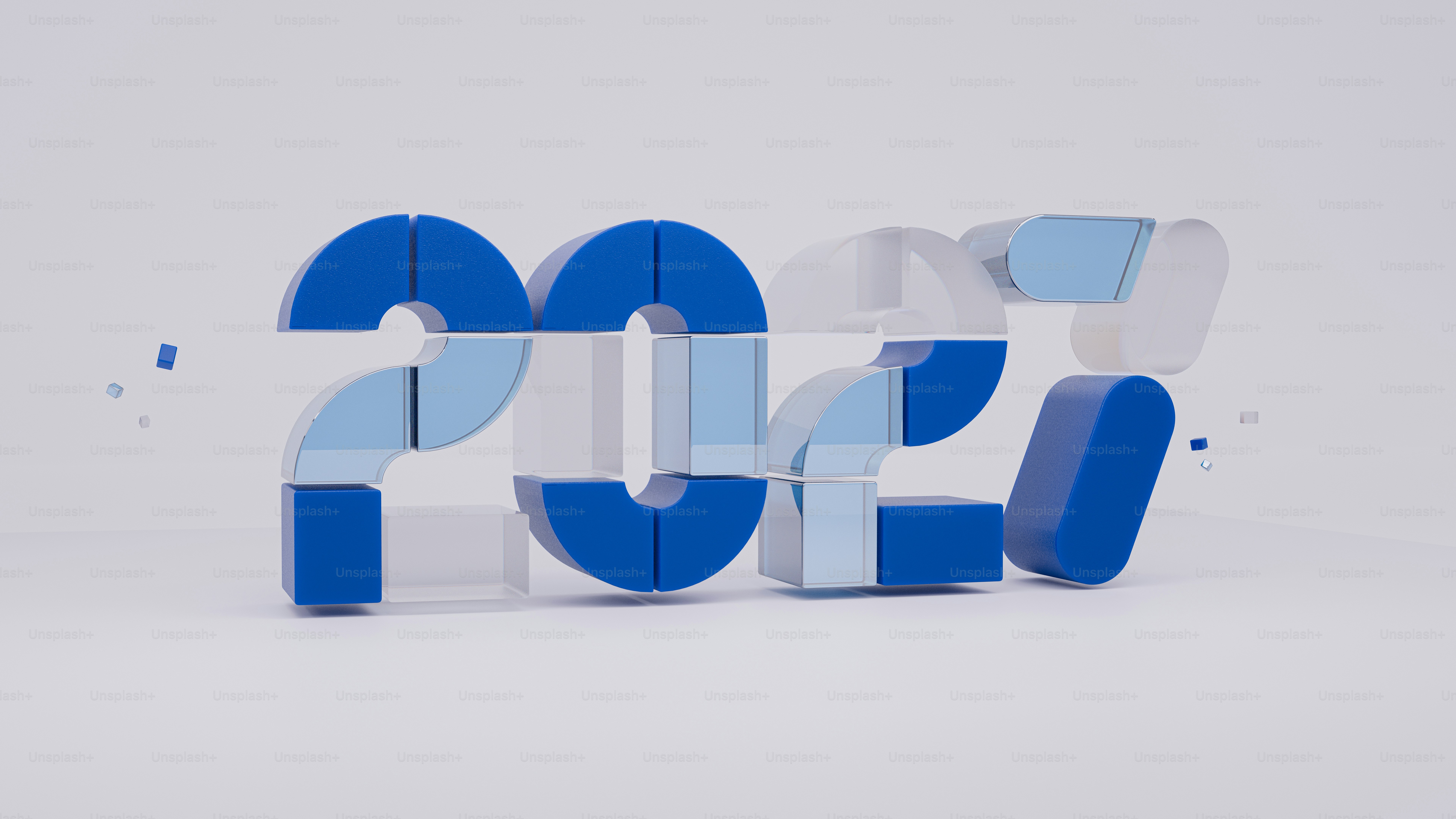 The number 2027 in blue and translucent glass blocks on a white surface