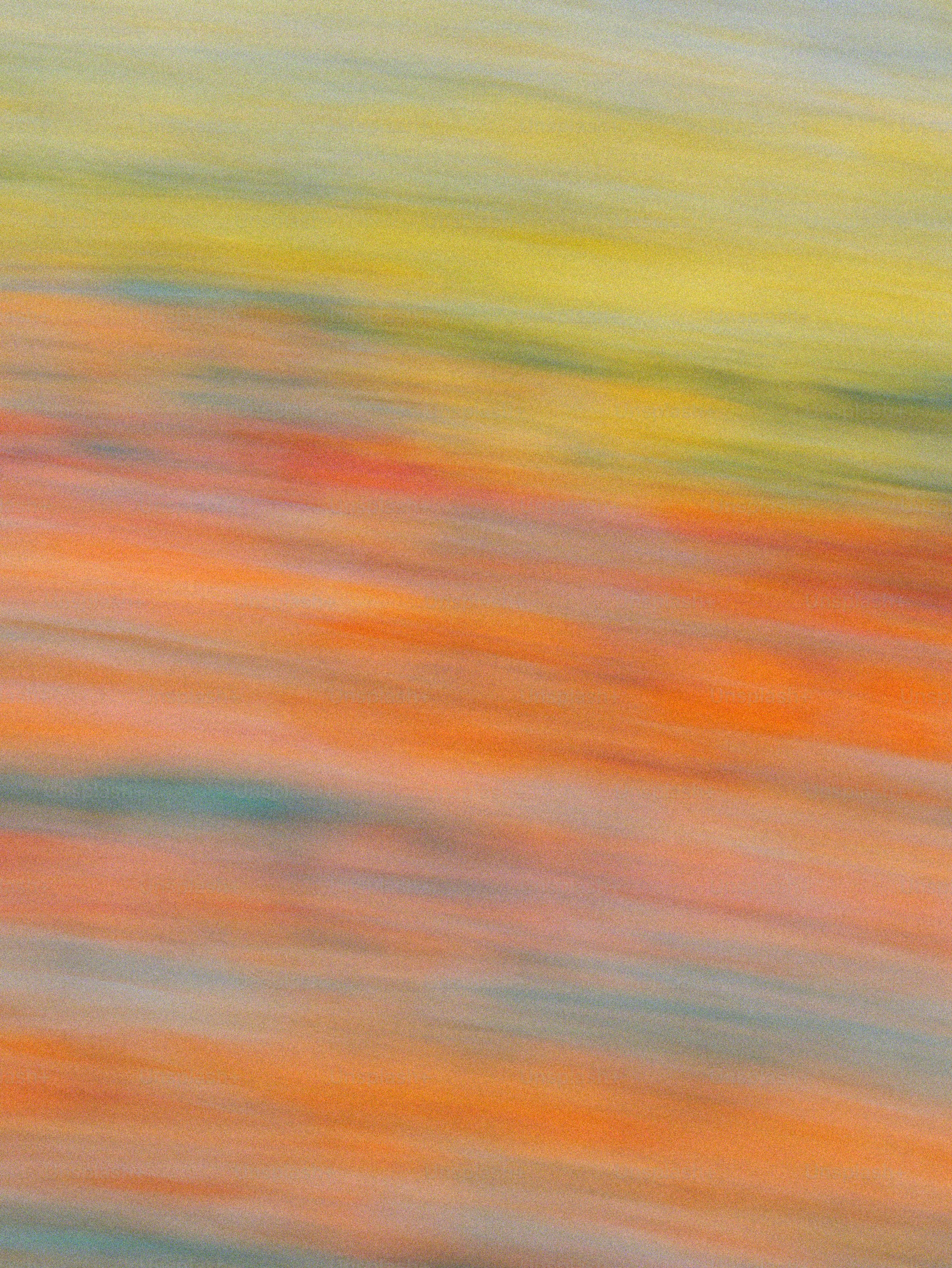 Abstract motion blur with horizontal streaks of yellow, orange, and blue