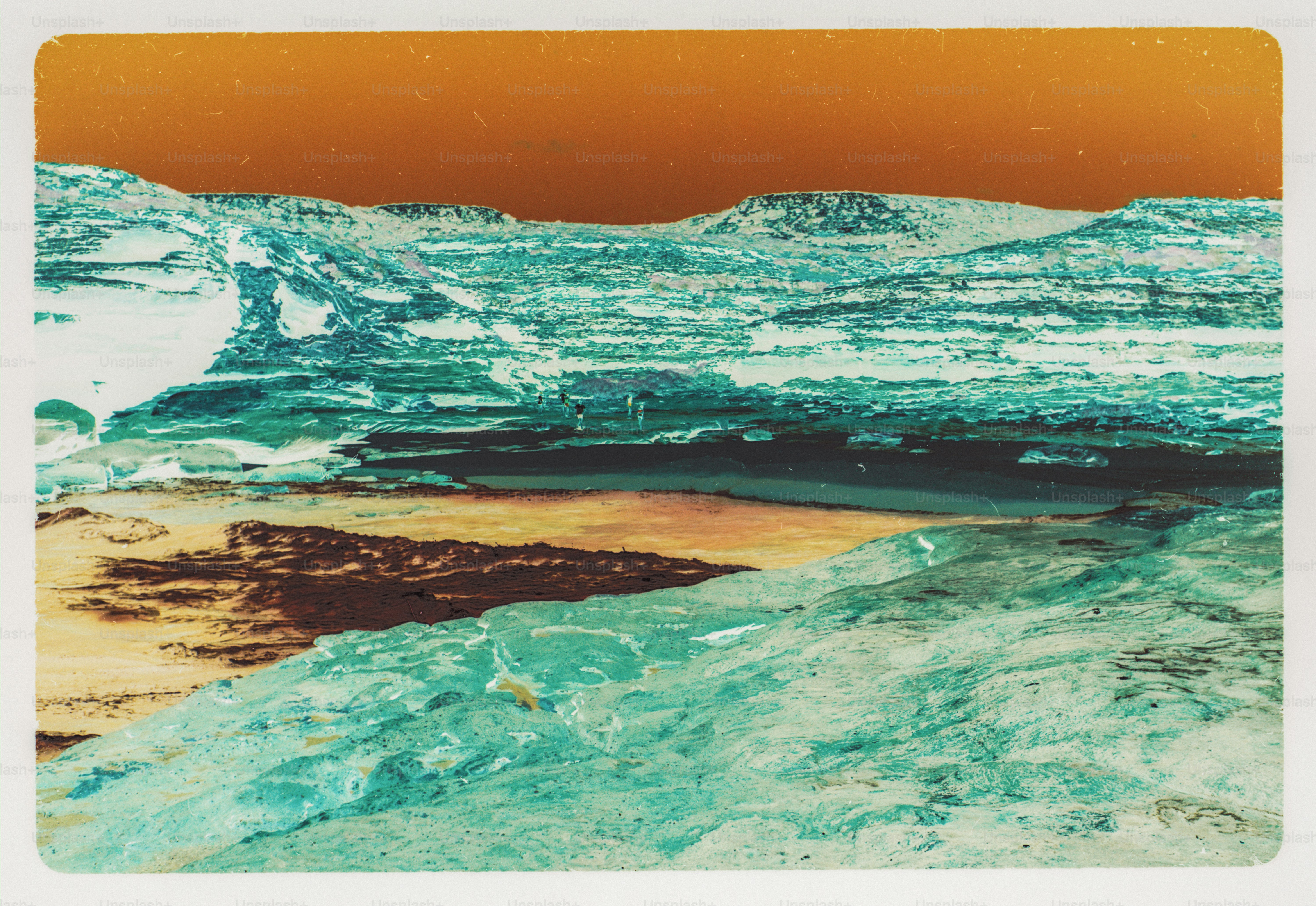 An inverted color landscape with turquoise rocky terrain and a dark orange sky