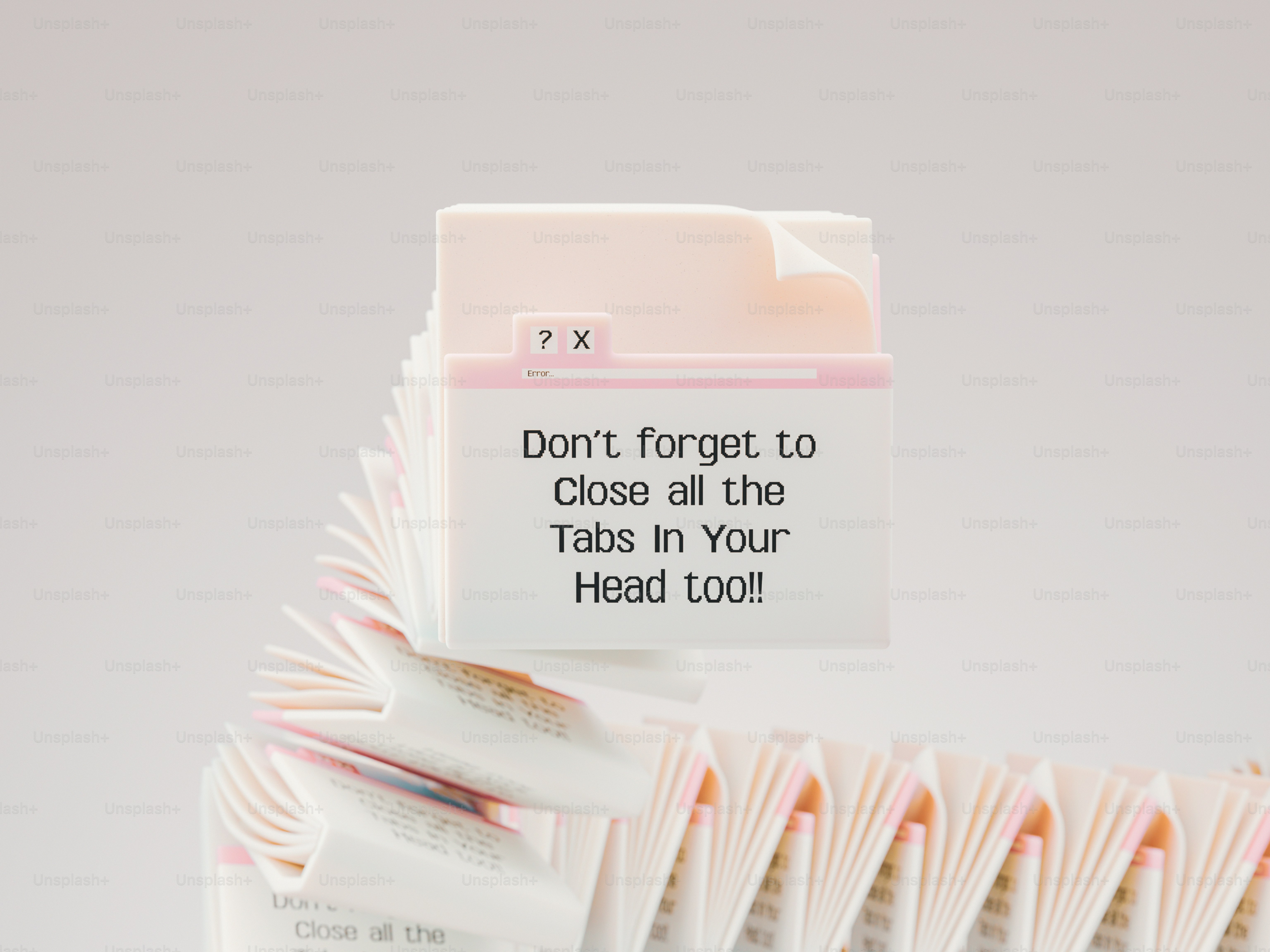 A stack of paper notes shaped like computer browser tabs with text
