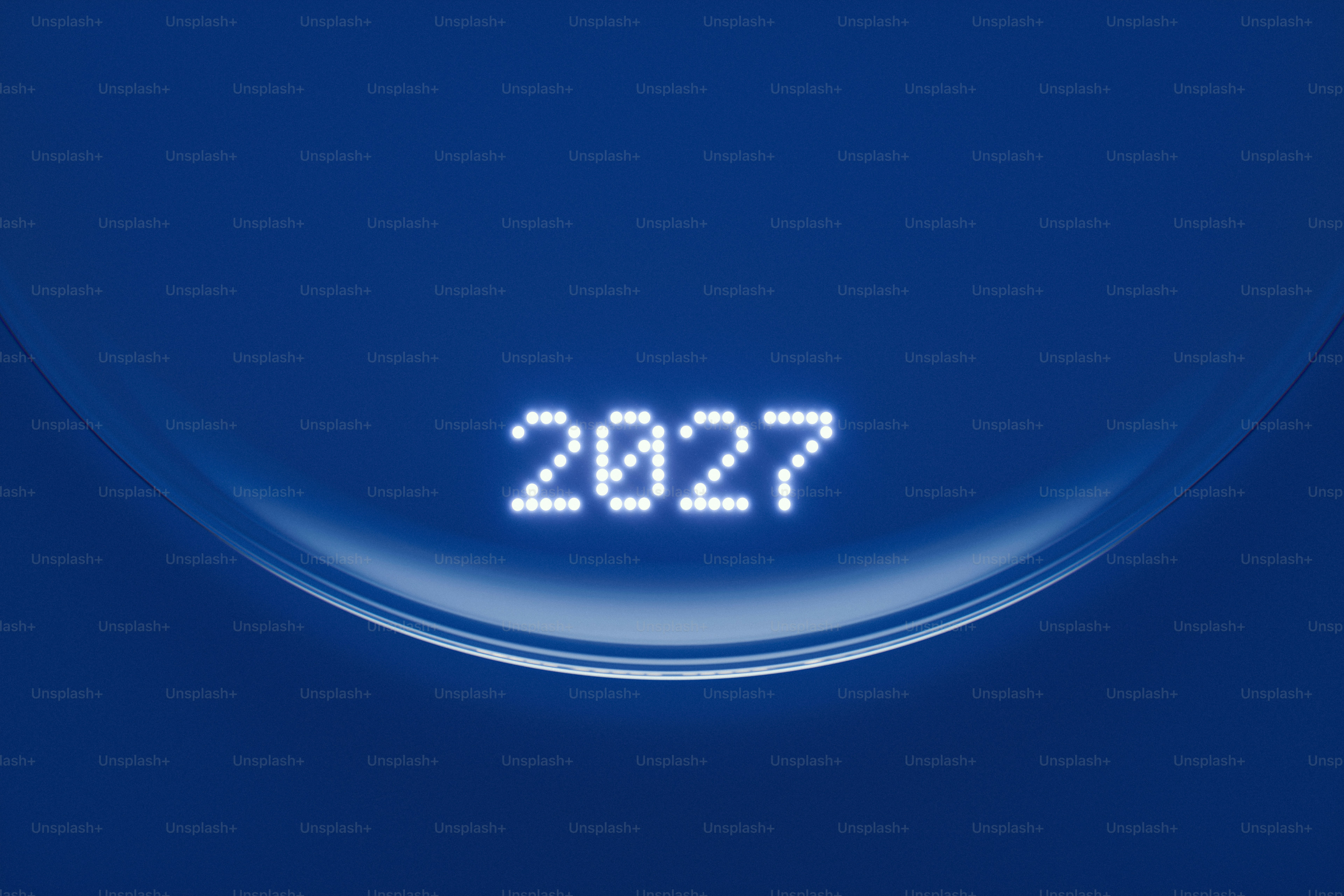 The number 2027 formed by glowing white dots on a dark blue background