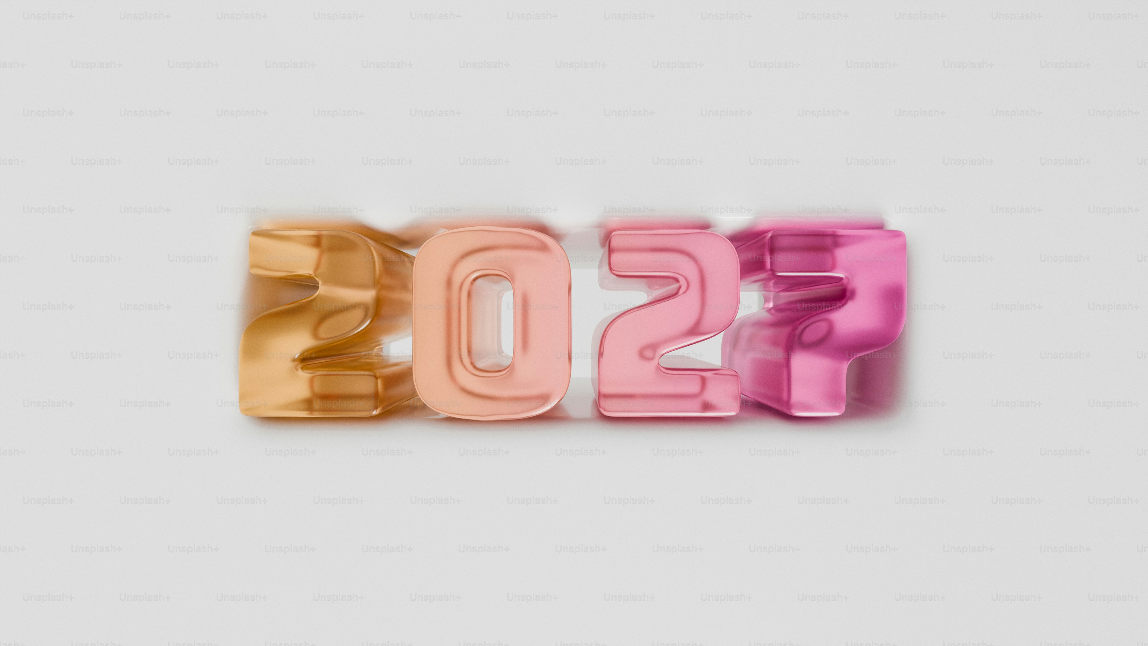 The numbers 2027 in metallic gold and pink on a white background