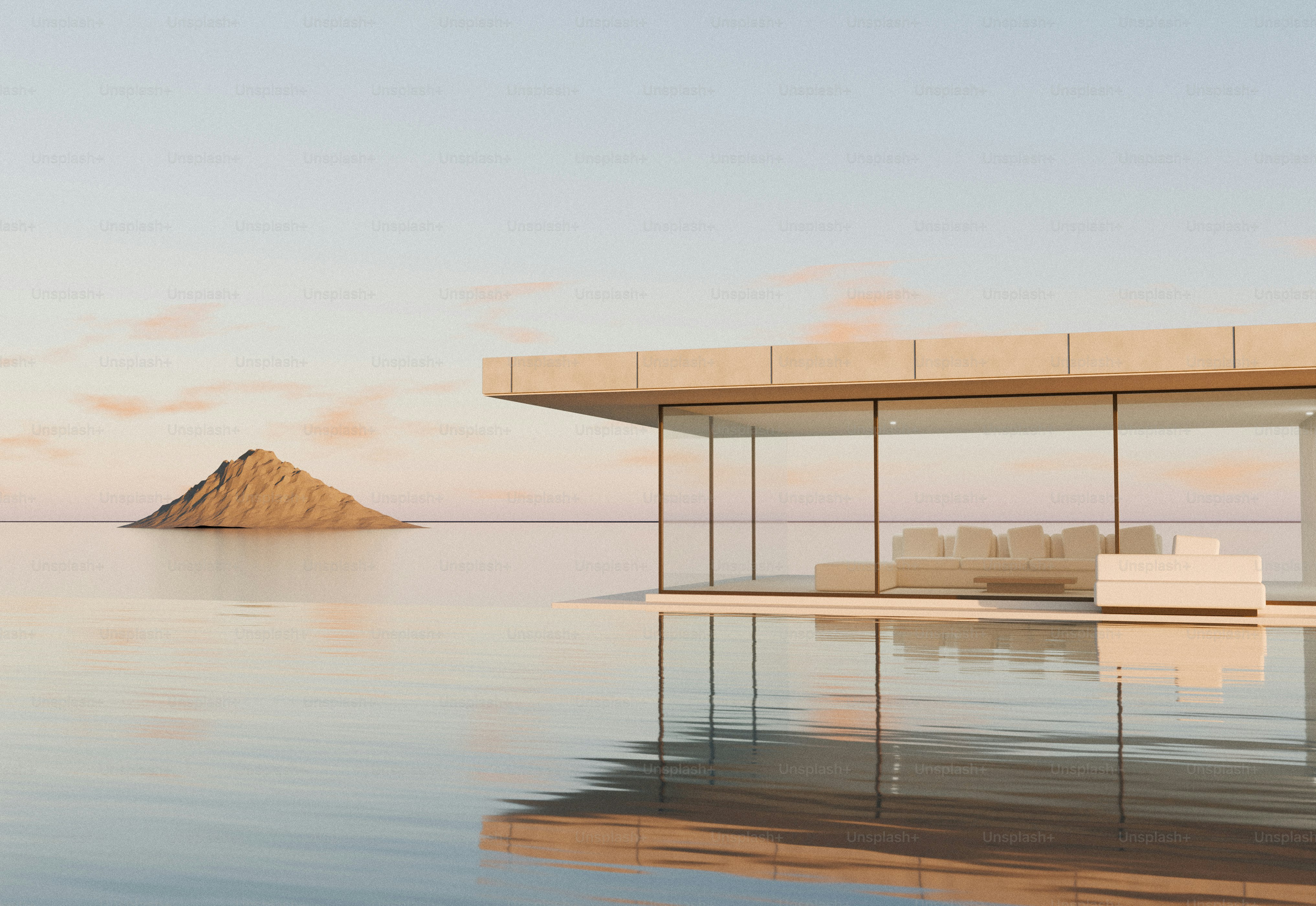 A modern glass house on a calm lake with a distant rocky island