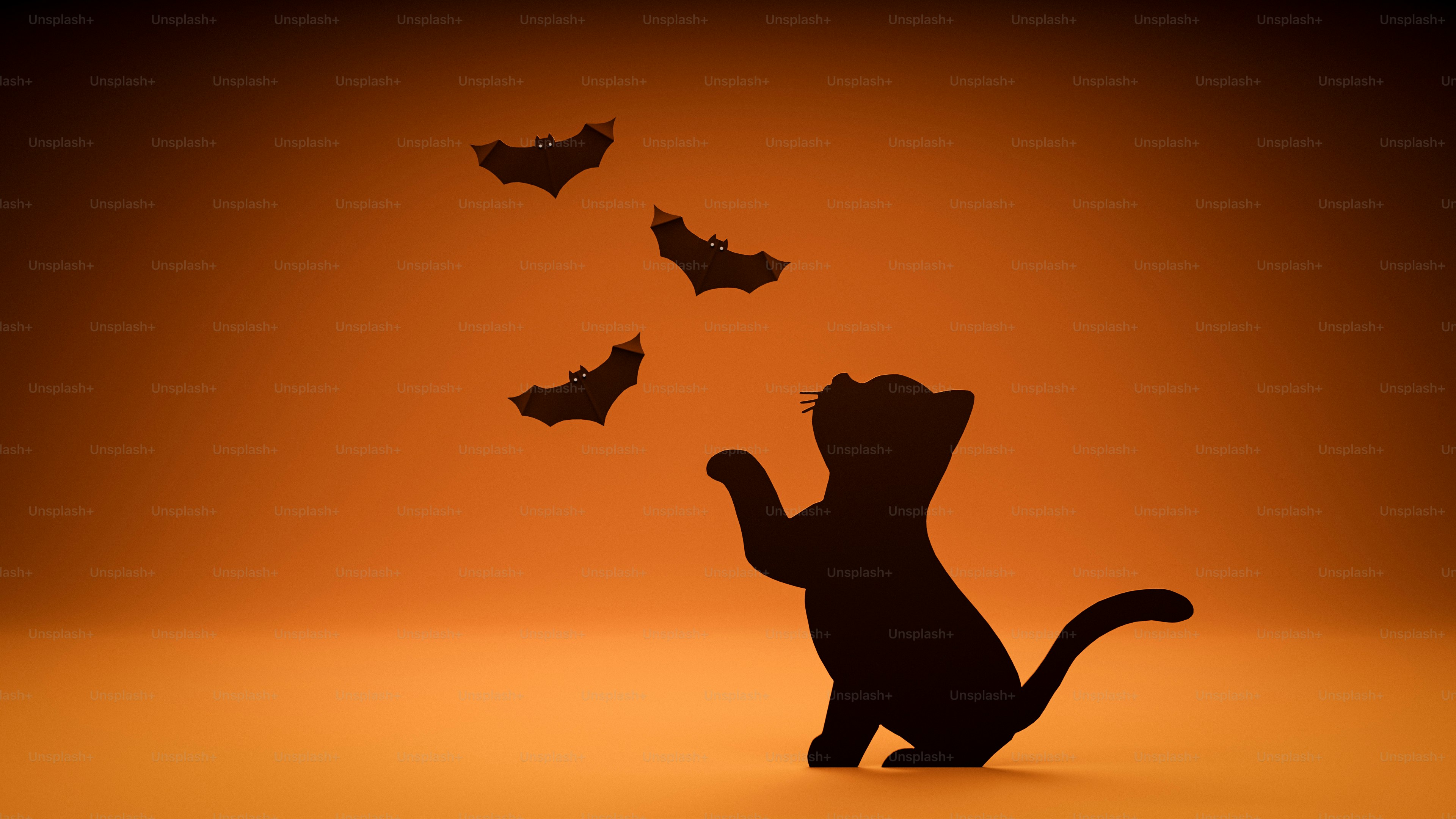 A black cat silhouette reaching for three paper bats against an orange background