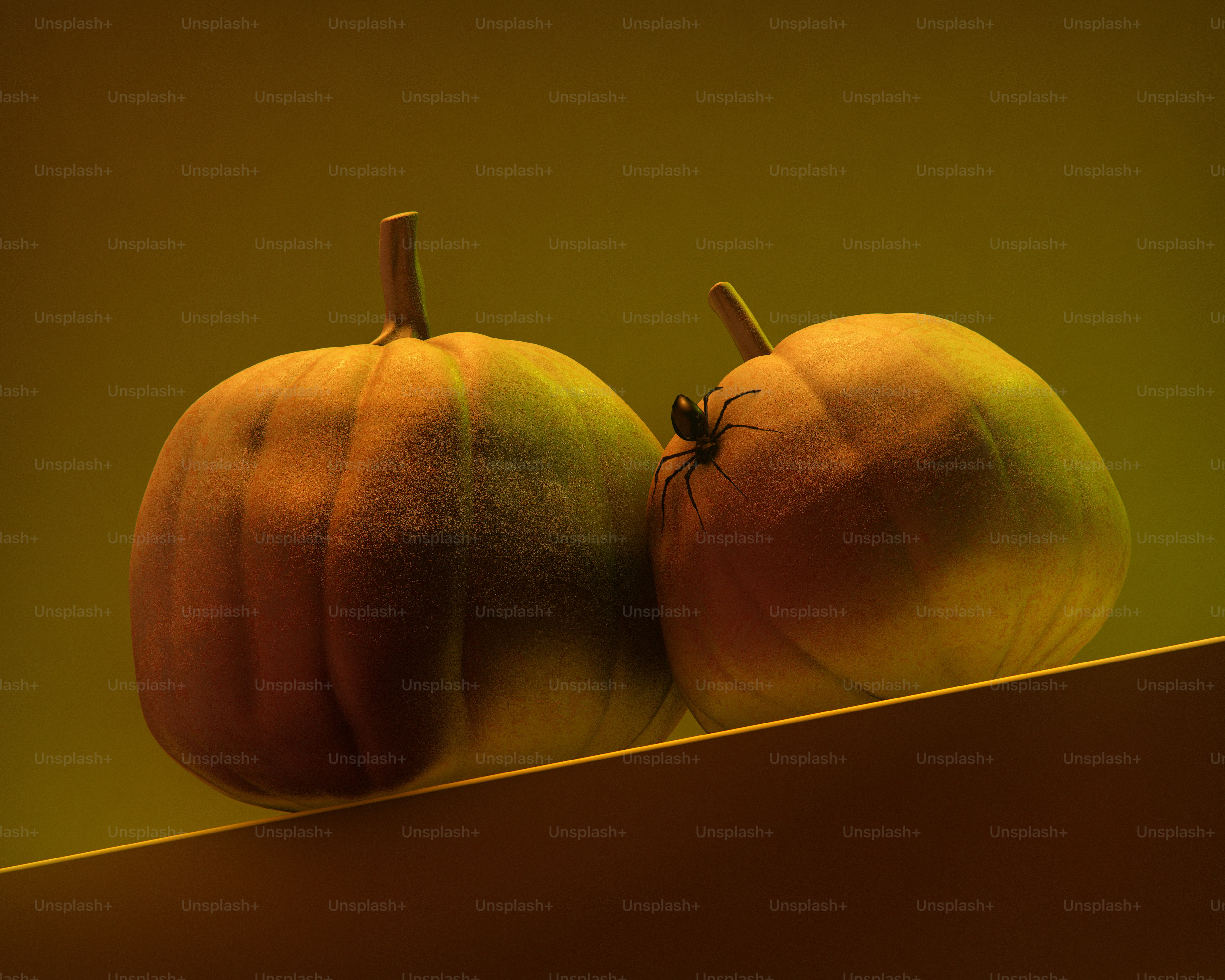 Pumpkin with spider on red background - Photo on Unsplash+